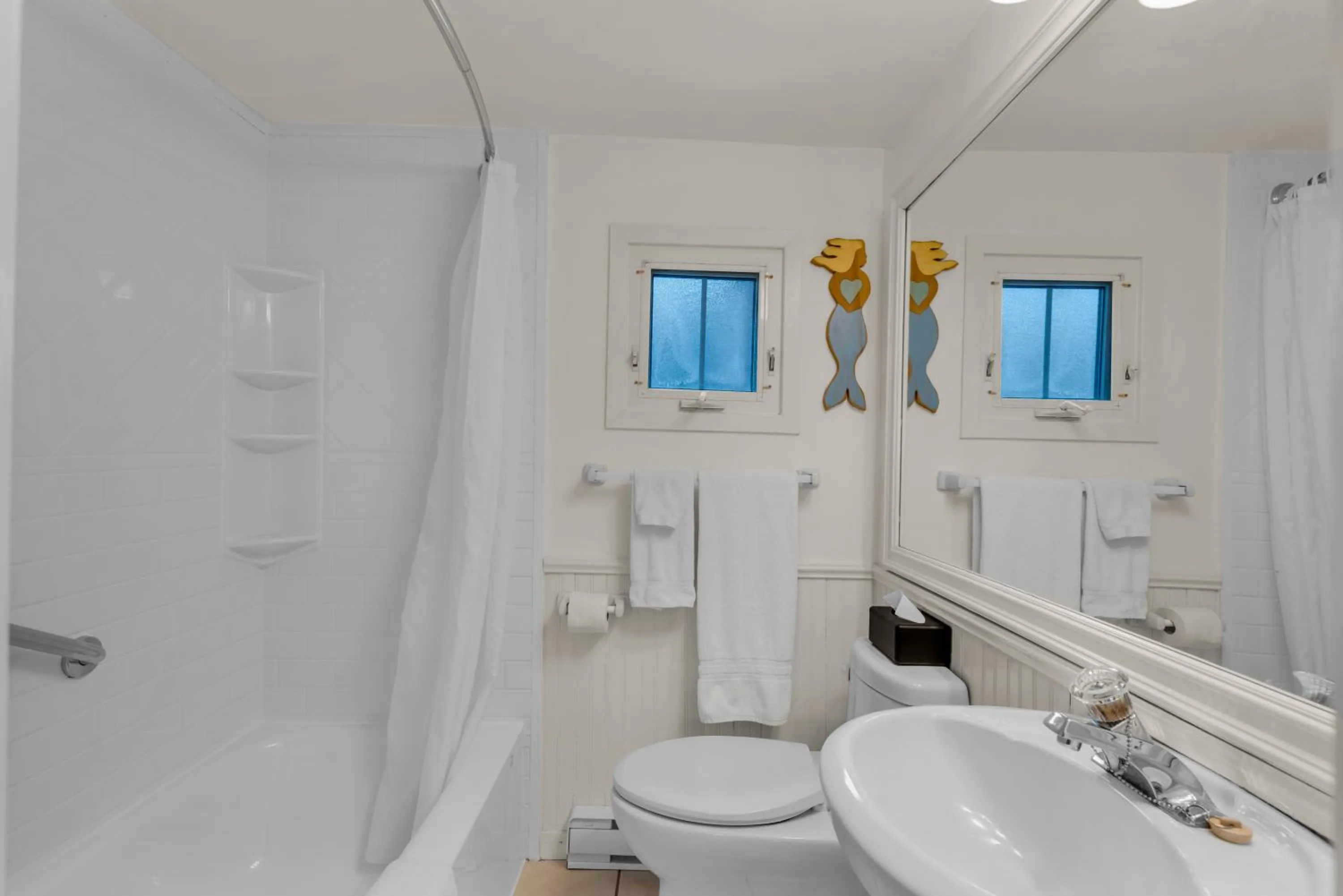 Toilet in White Point Beach Resort