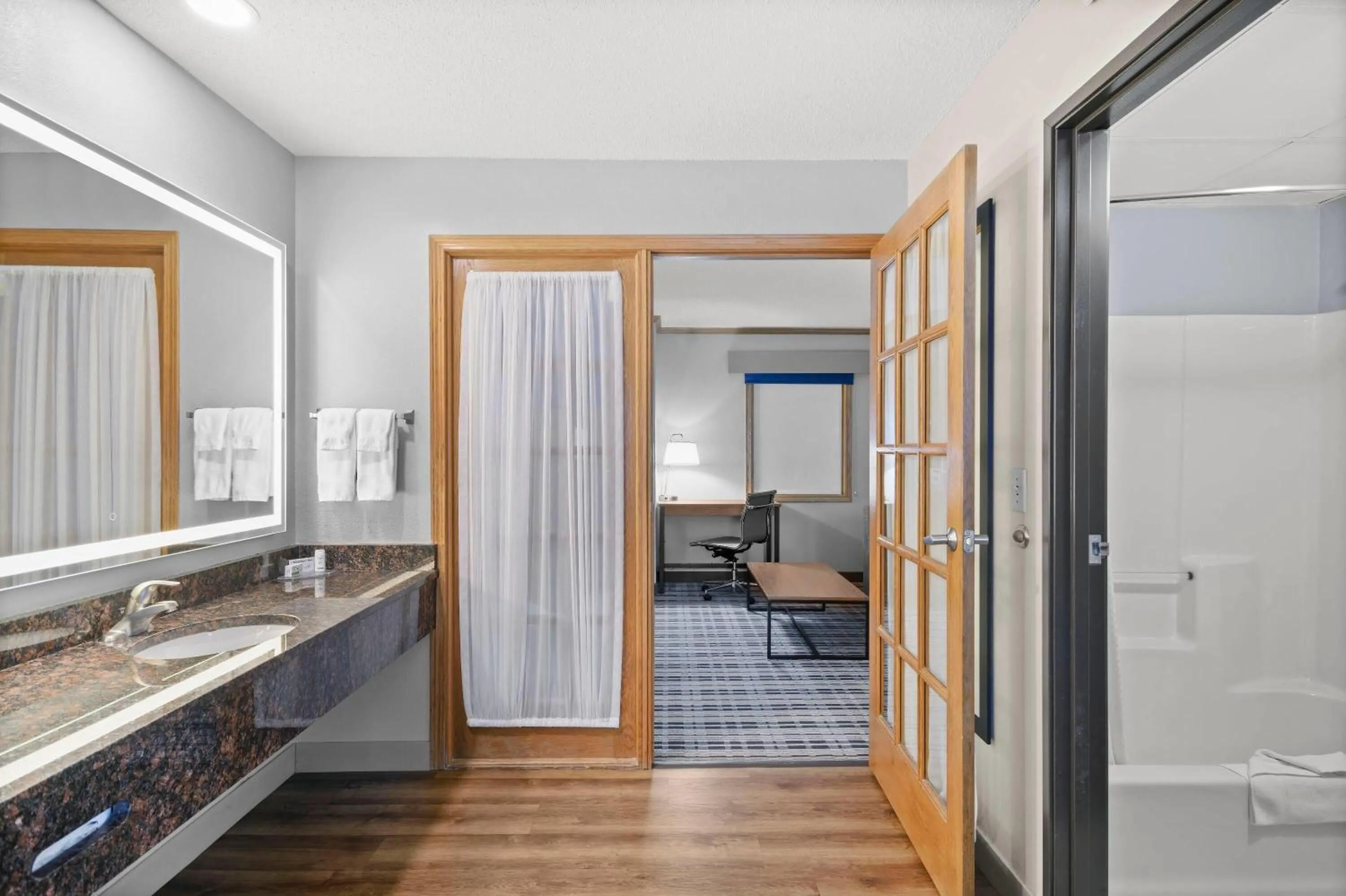 Bathroom in AmericInn by Wyndham Virginia