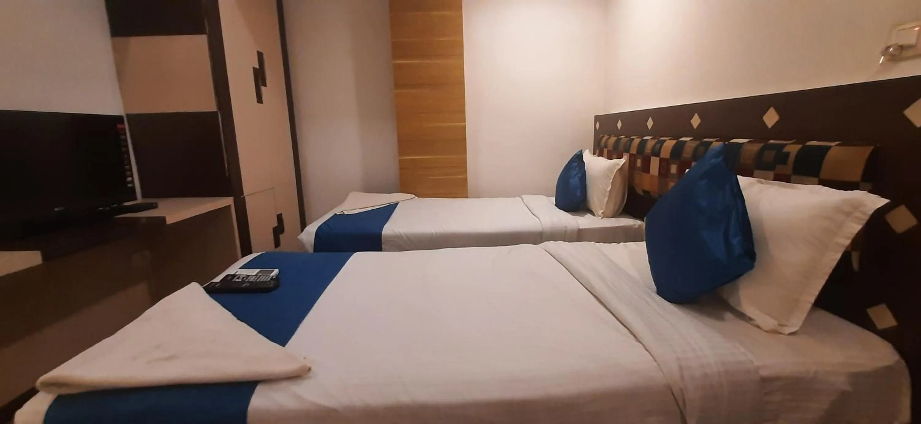 Bed in Hotel Kosala Vijayawada