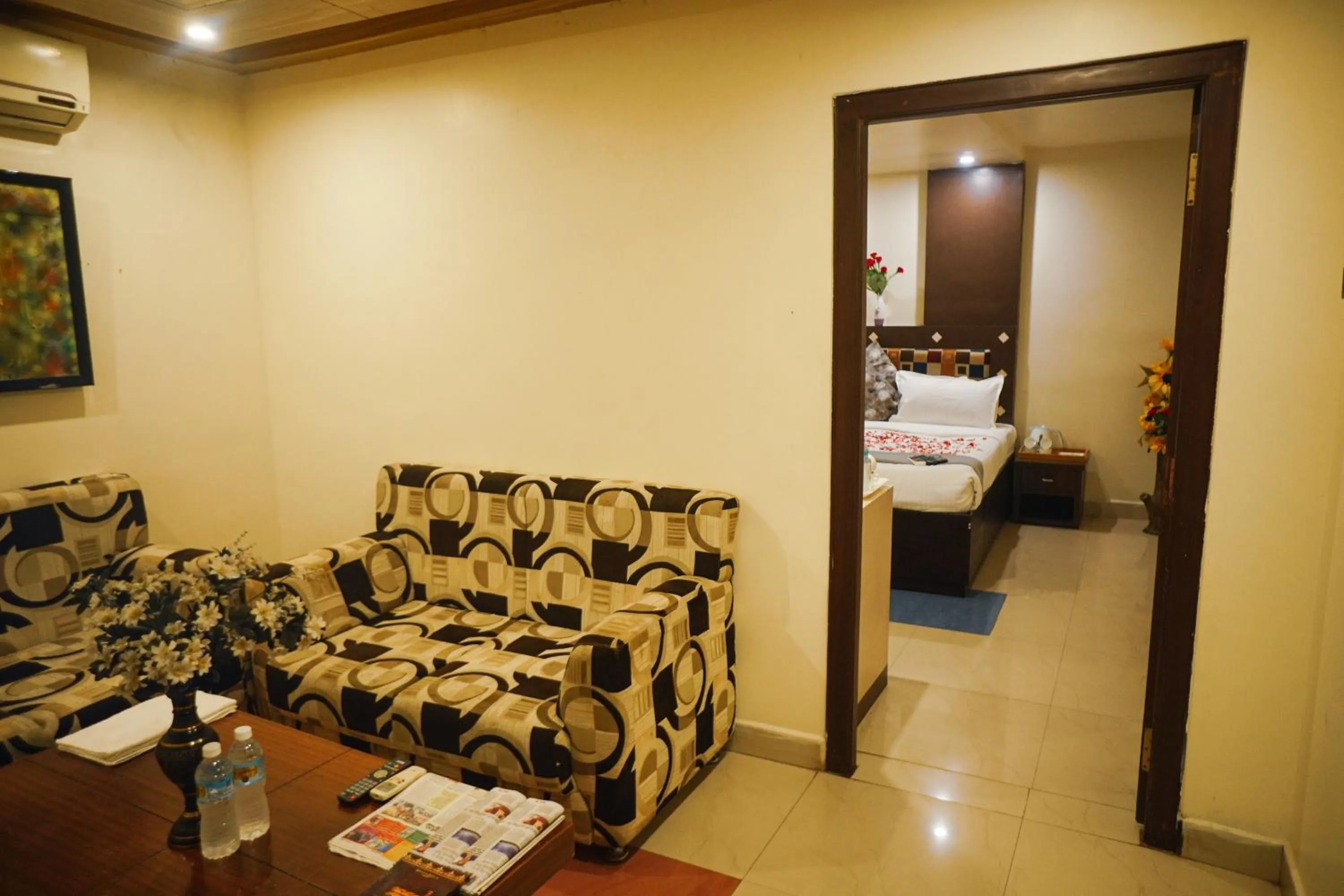 Living room, Bed in Hotel Kosala Vijayawada