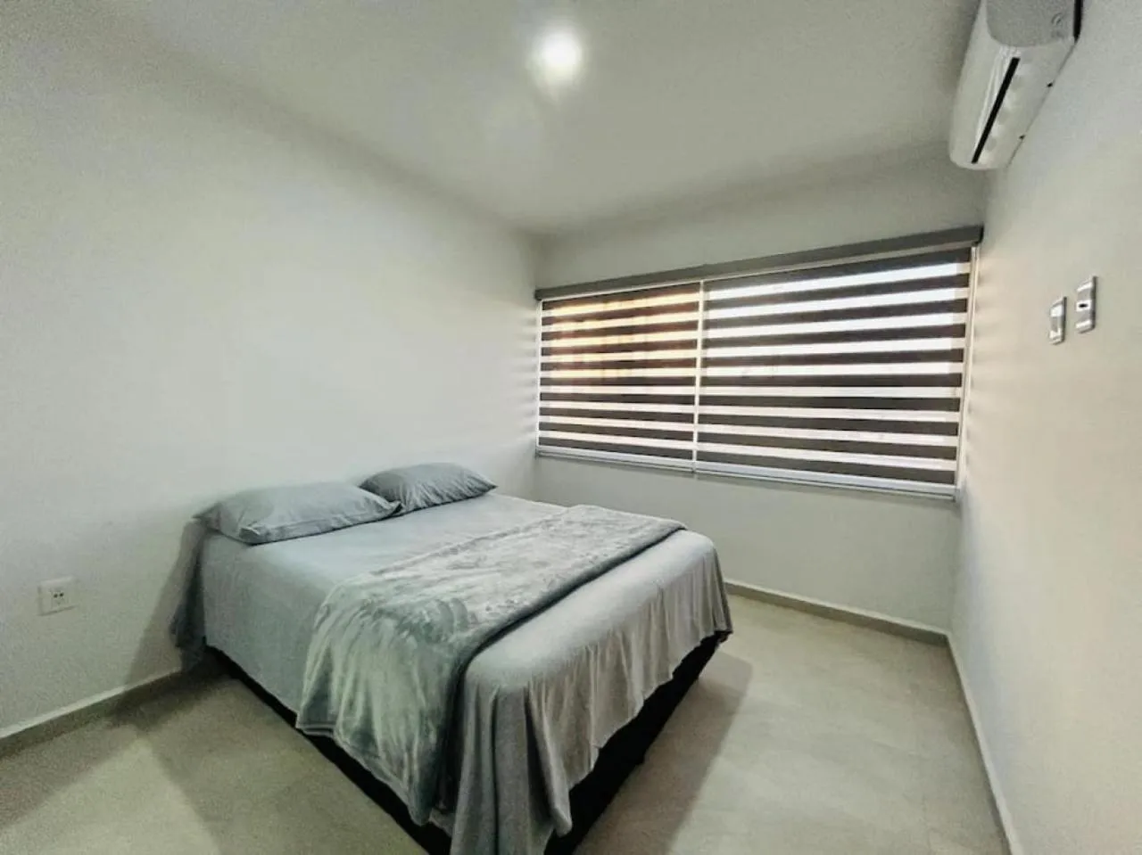 Bed in Bluú lagoon · Depa enorme alberca