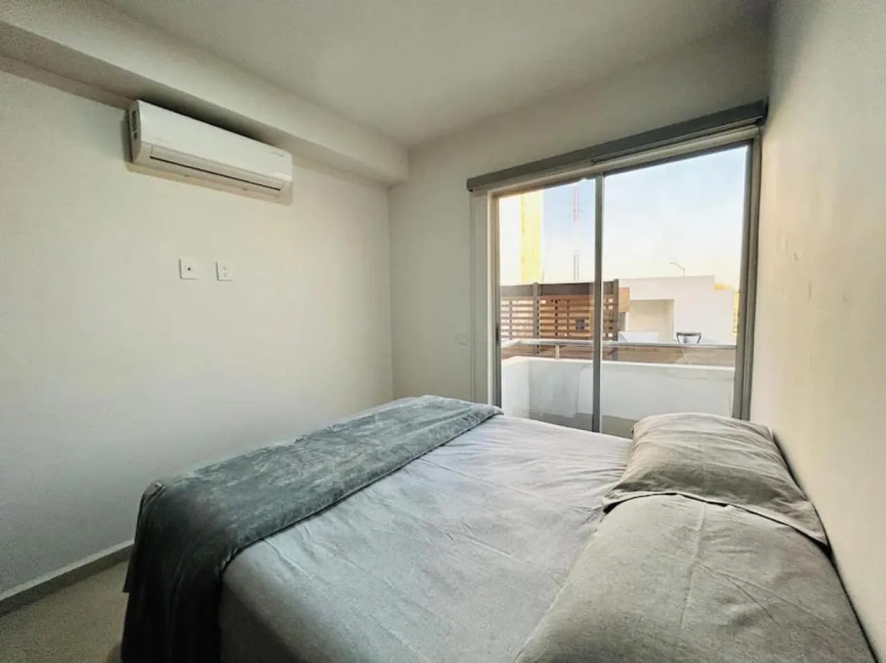 Bed in Bluú lagoon · Depa enorme alberca