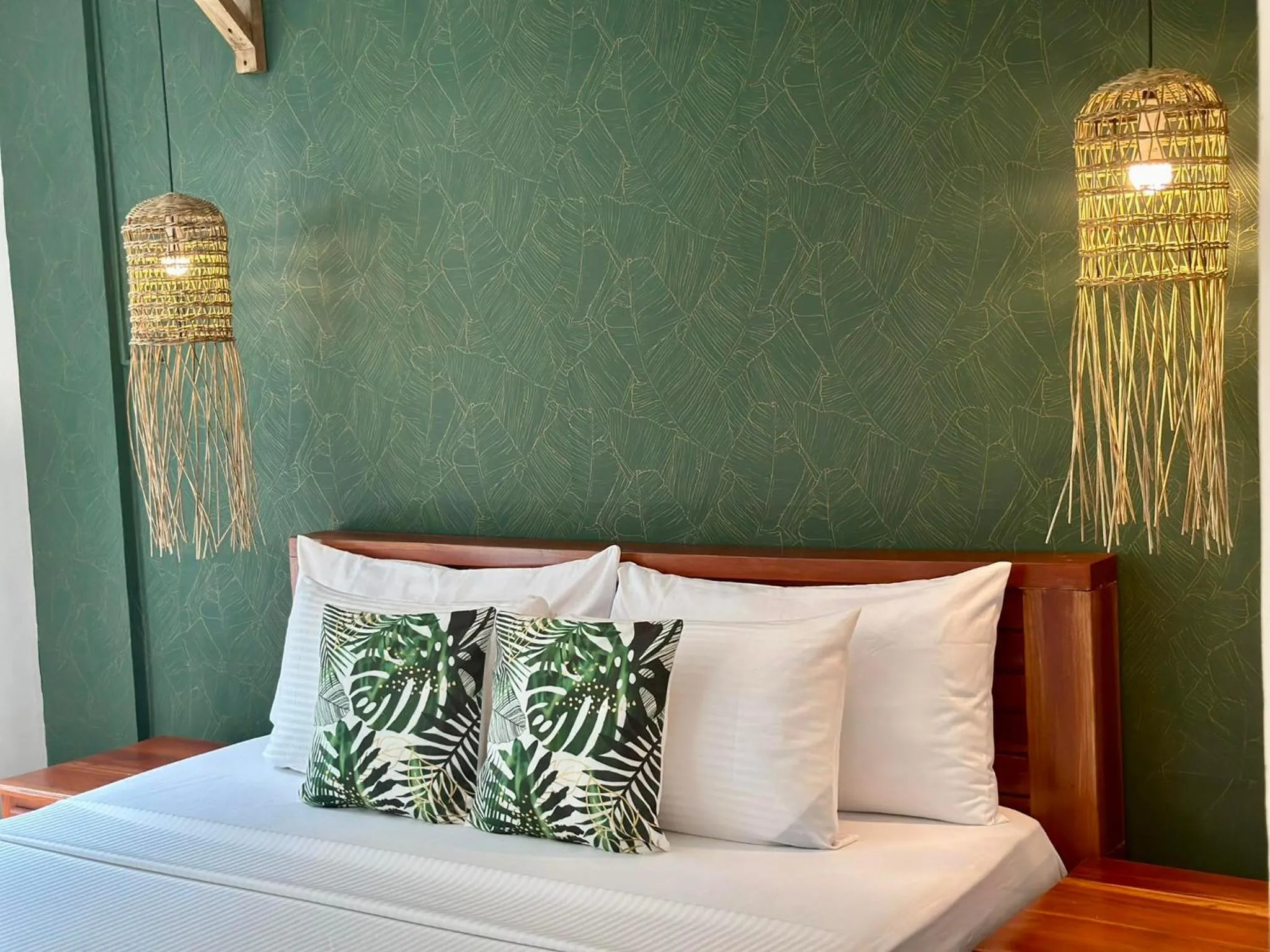 Bed in DENGI INN EL NIDO