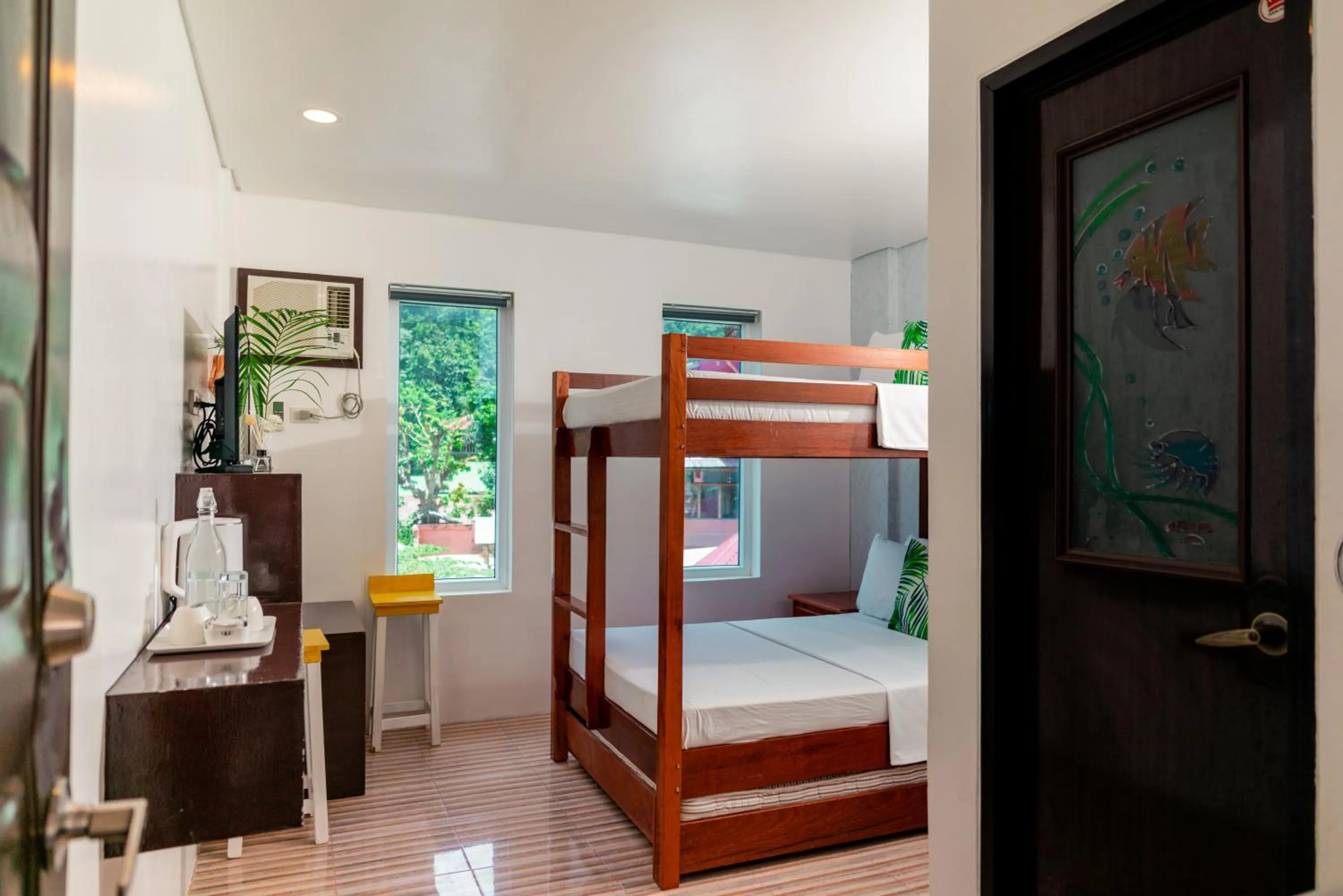 Bed in DENGI INN EL NIDO