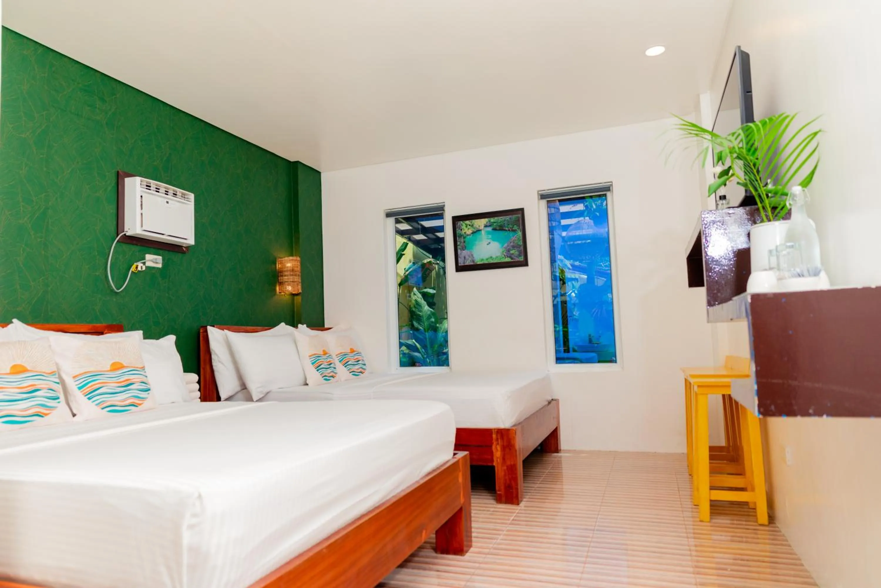 Bed in DENGI INN EL NIDO