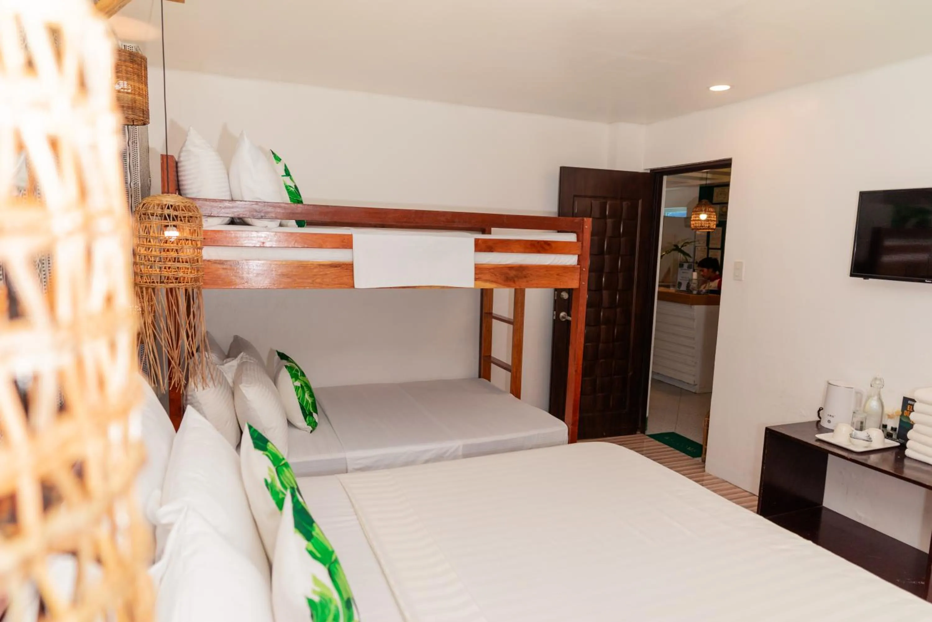 Bed in DENGI INN EL NIDO