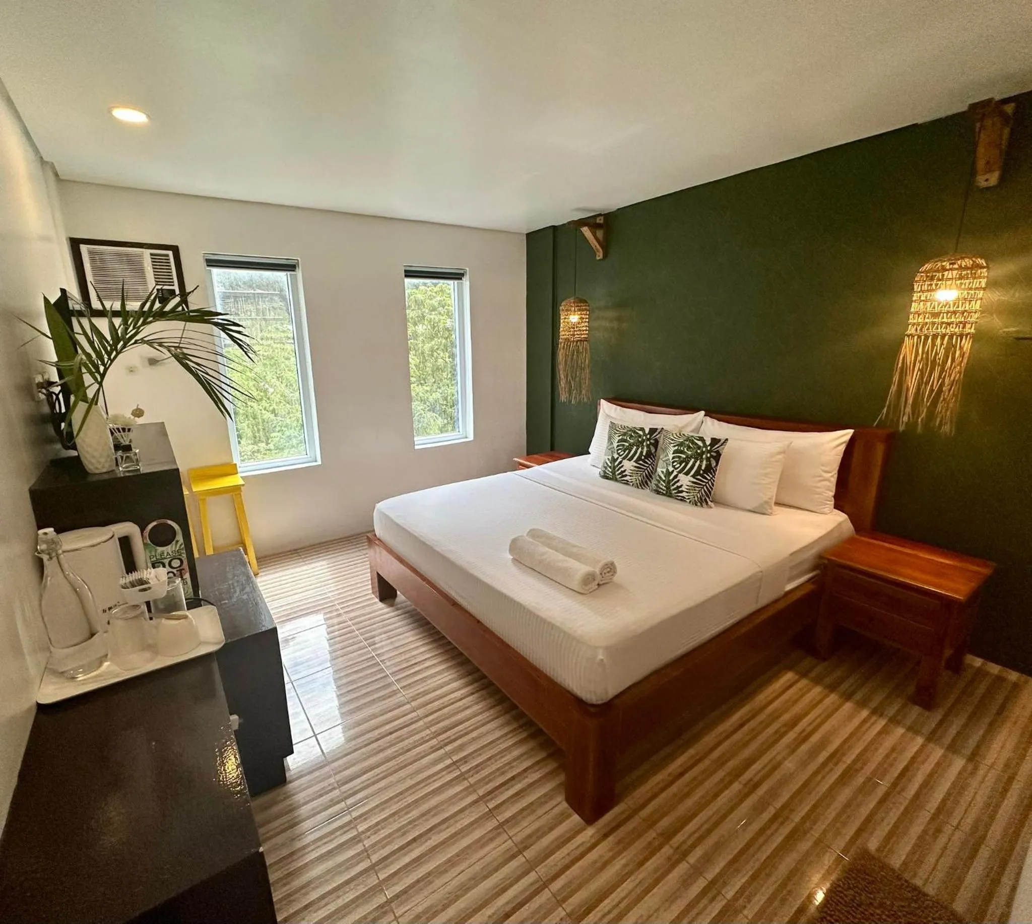 Bed in DENGI INN EL NIDO