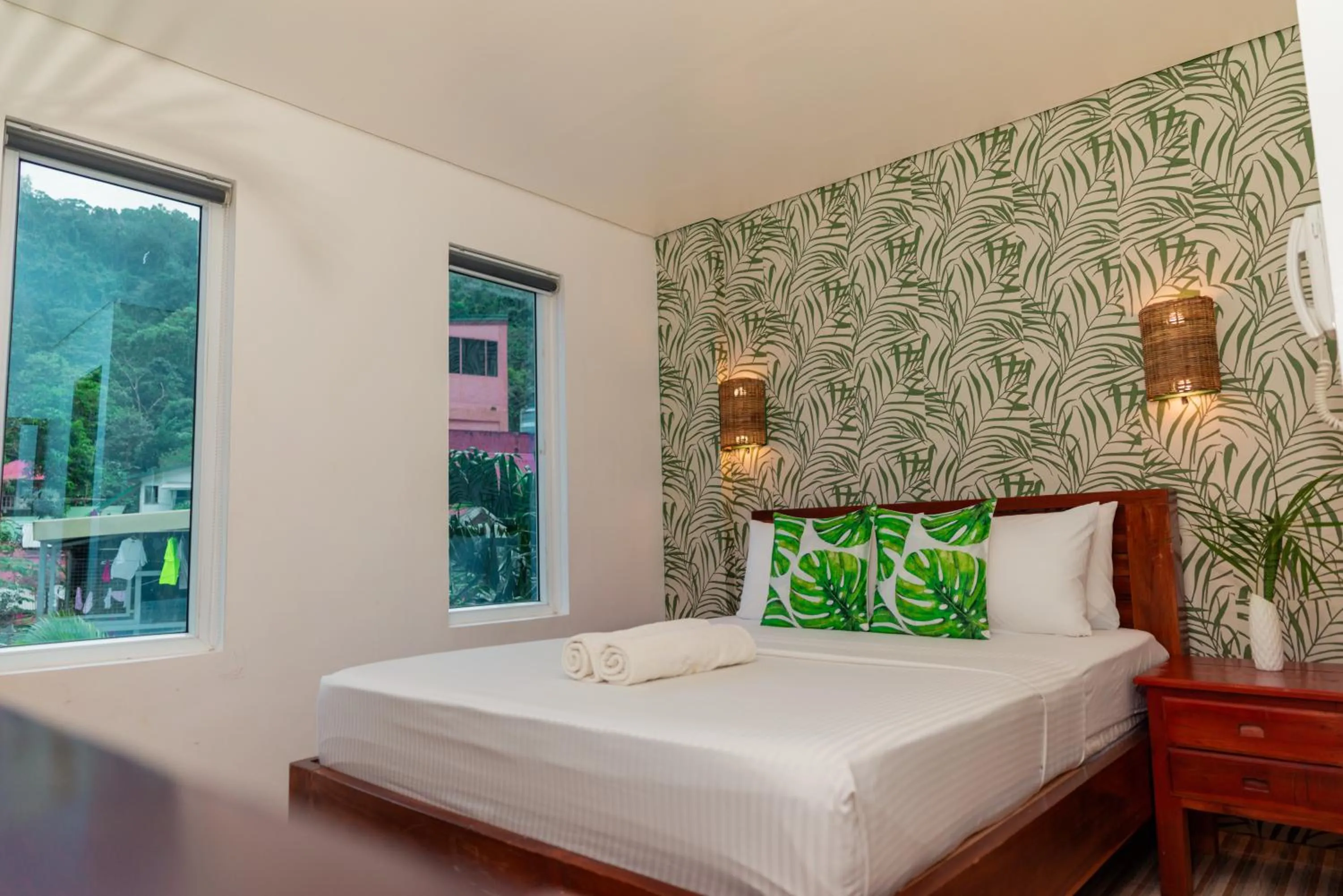 Bed in DENGI INN EL NIDO