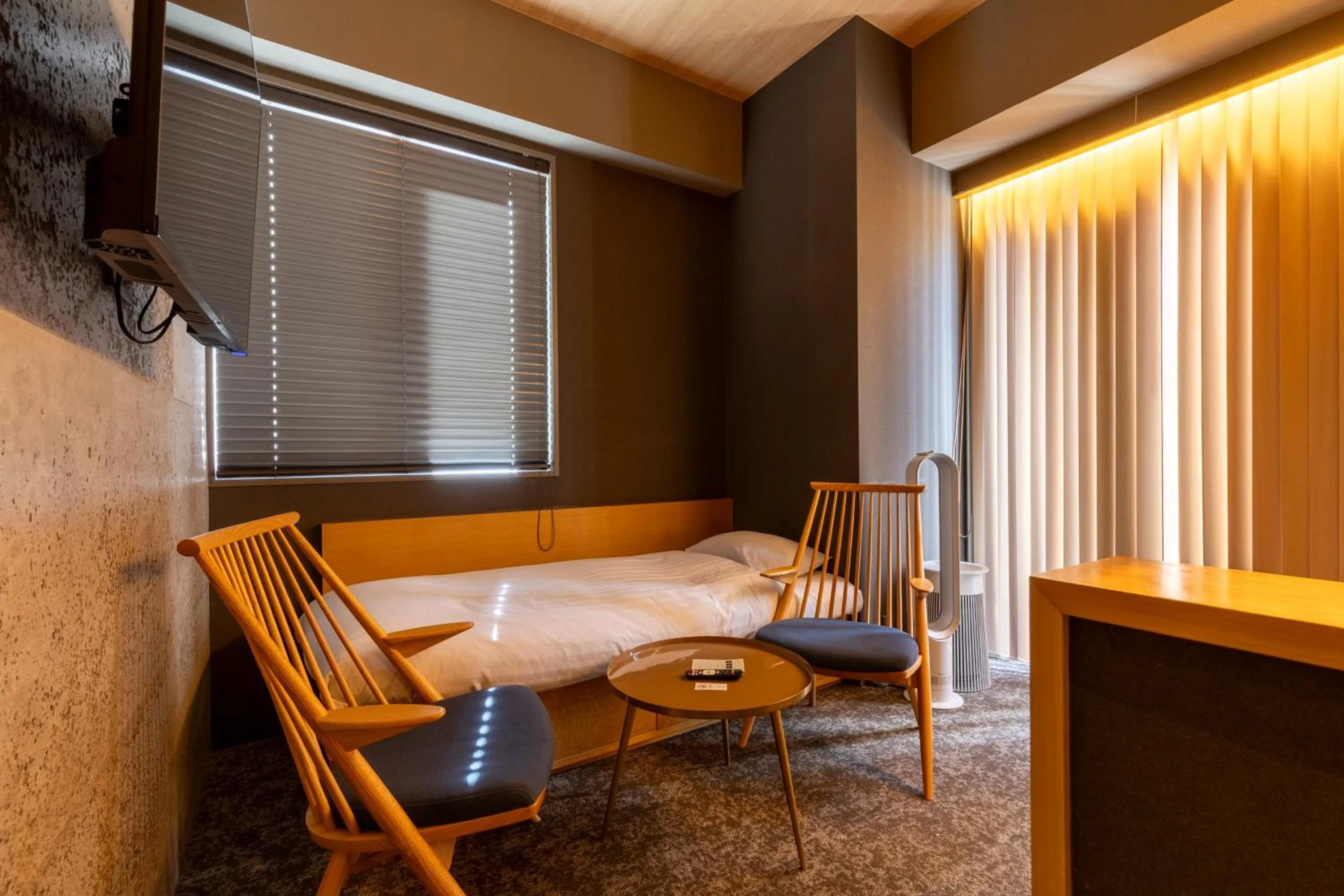 Bed in HOTEL TOMOS ASAKUSA