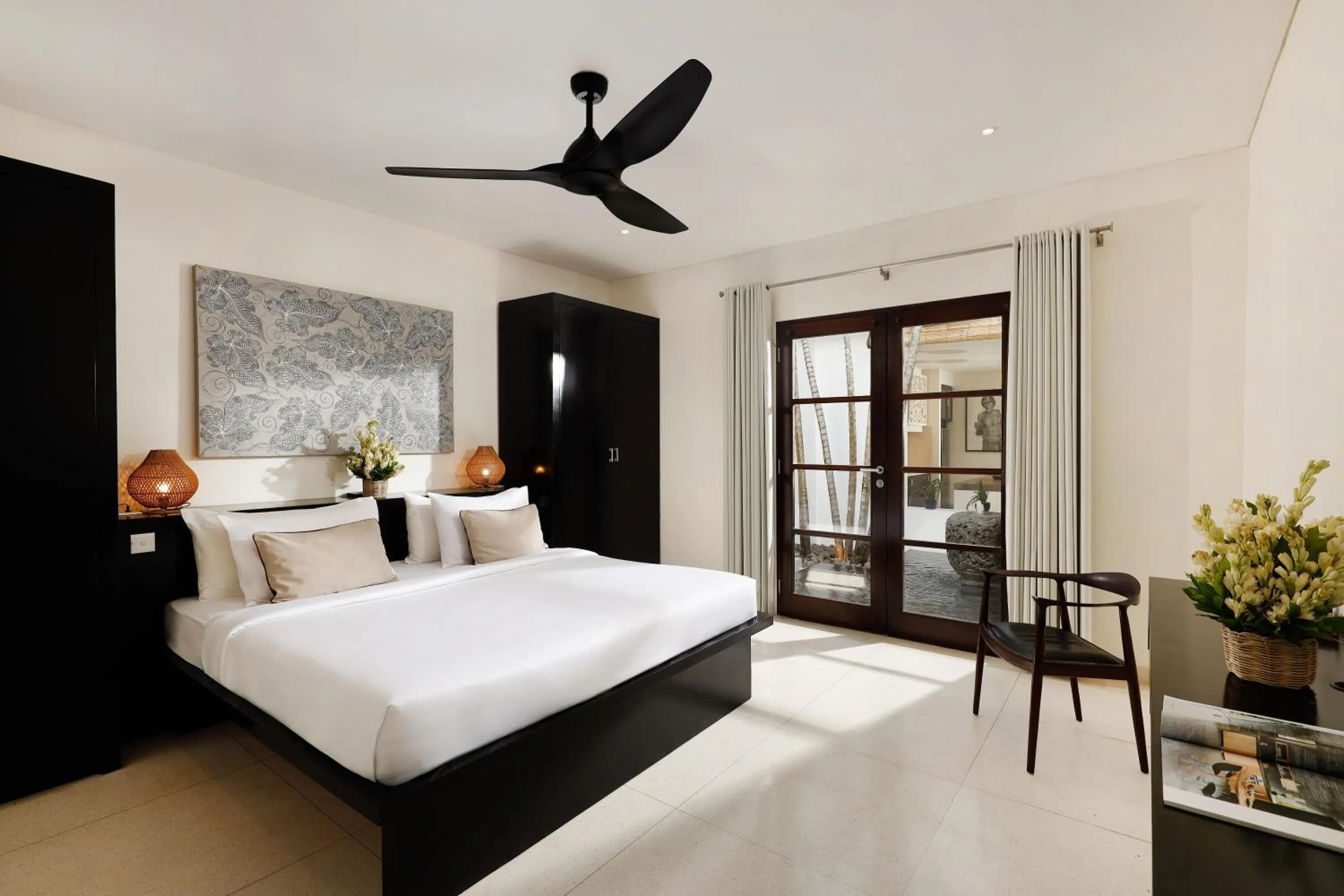 Bed in Black Beach Villa - Absolute Beachfront Escape