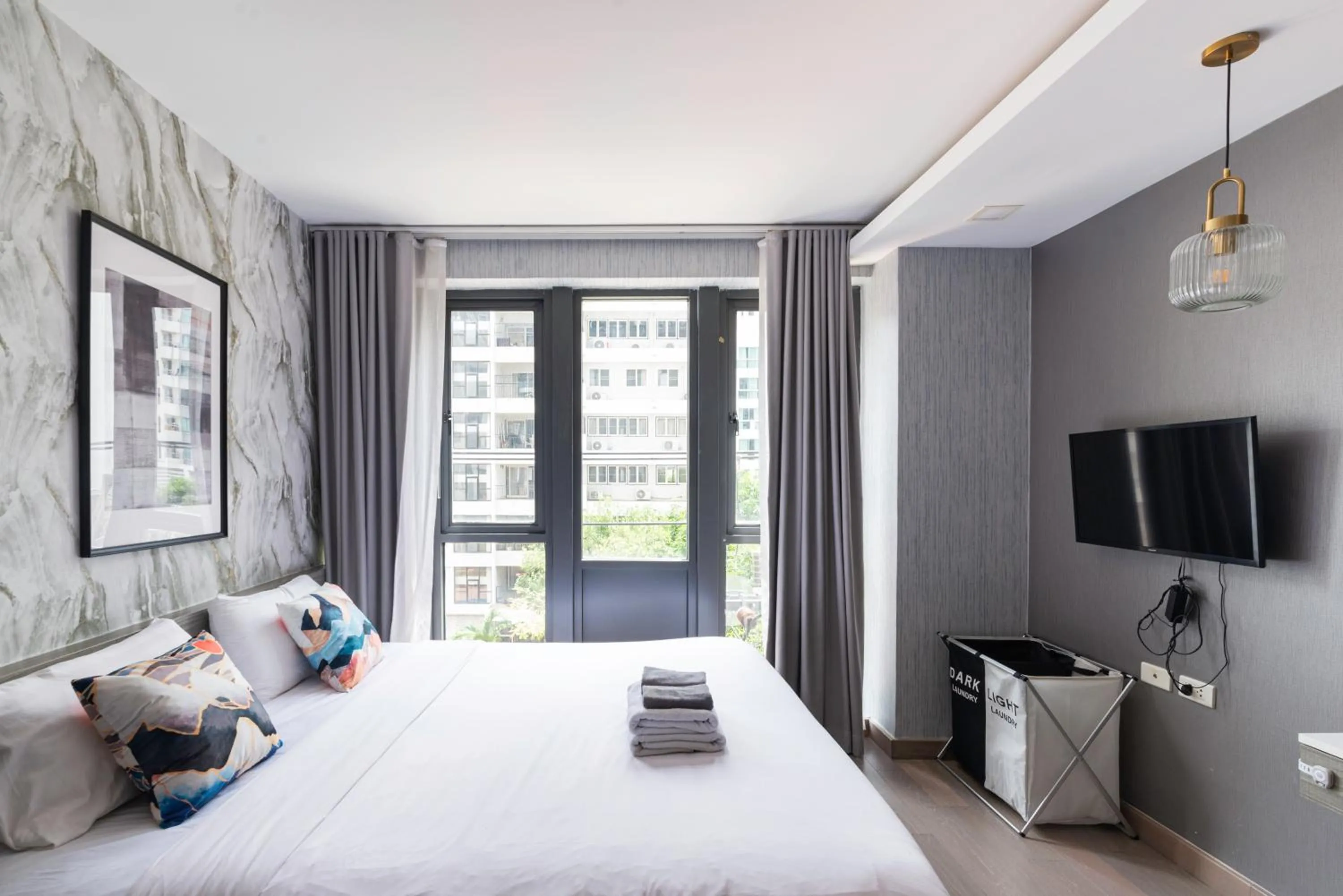 Bed in Dazzle Sukhumvit 7 by LeFoyer