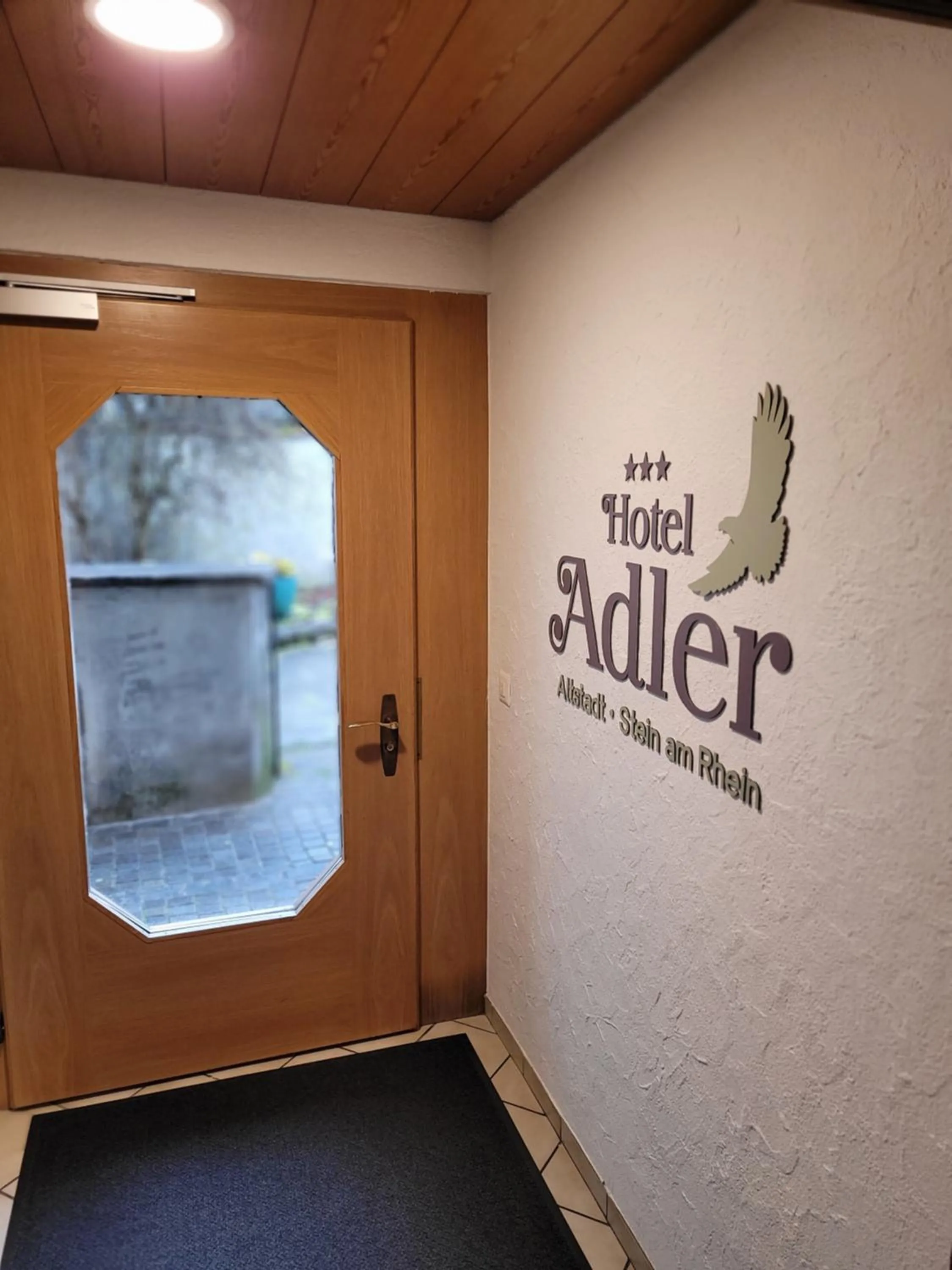 Property logo or sign in Hotel Adler