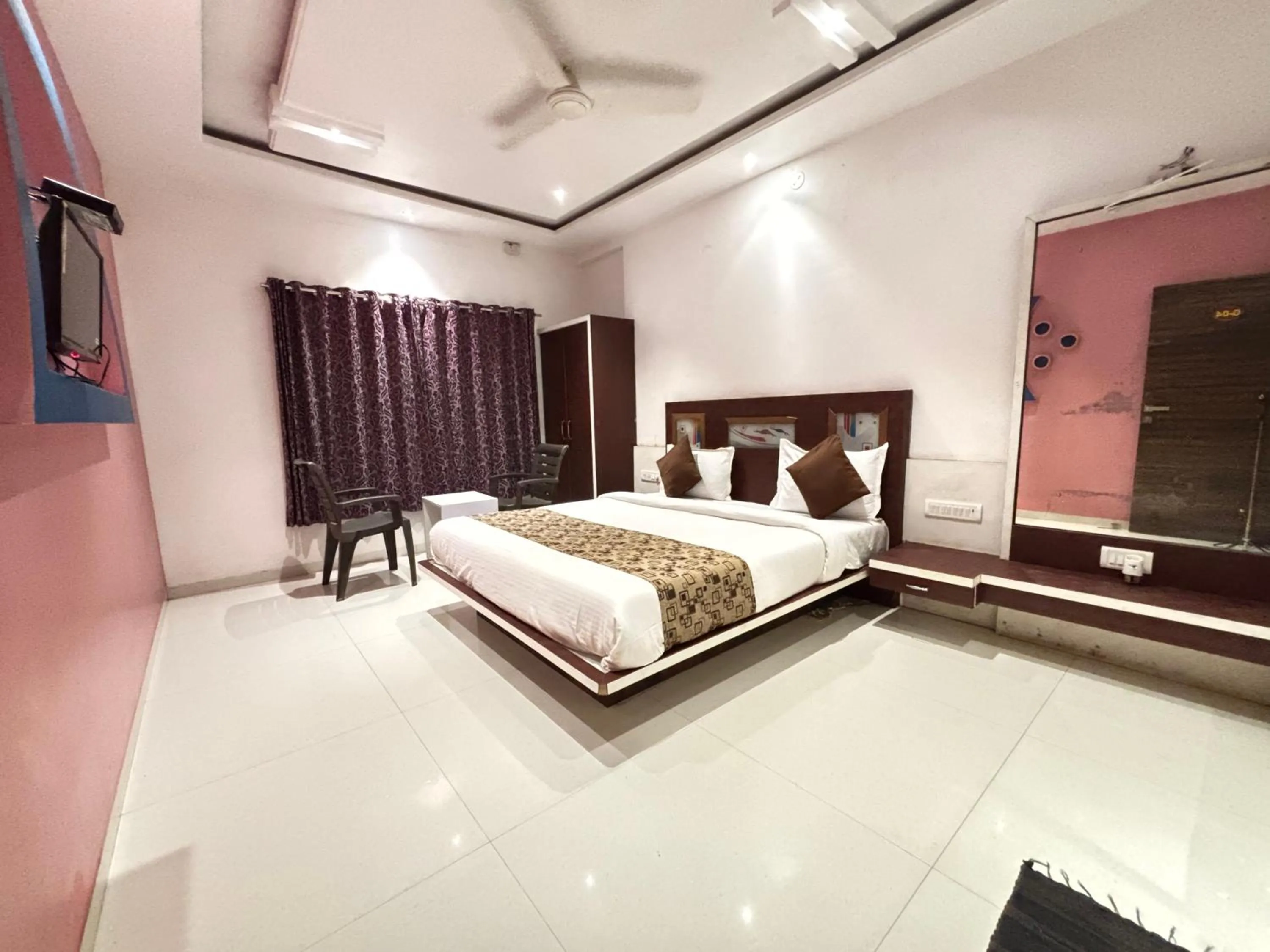 Bed in Veggies Residency