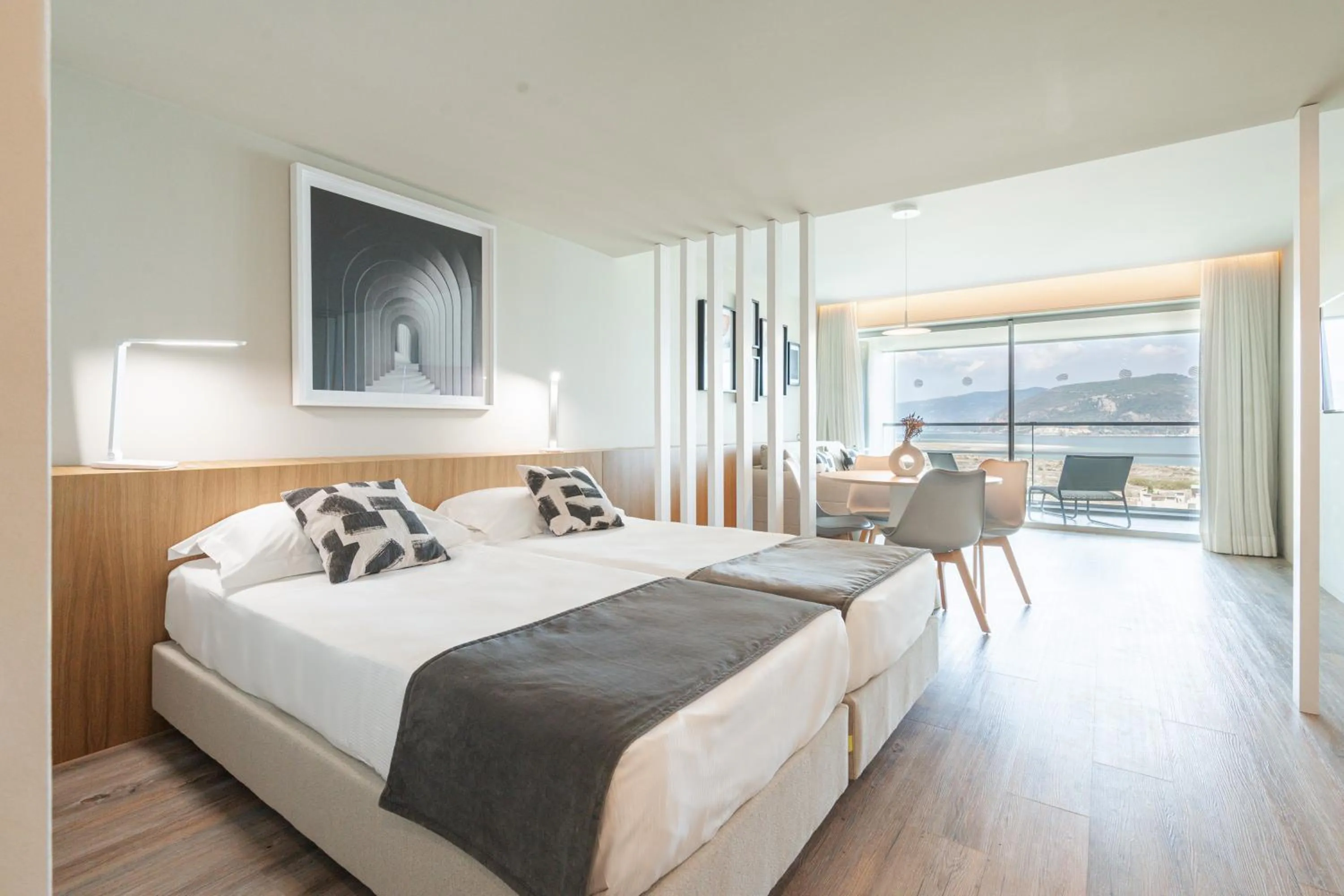 Bed in Aqualuz Troia Mar by The Editory