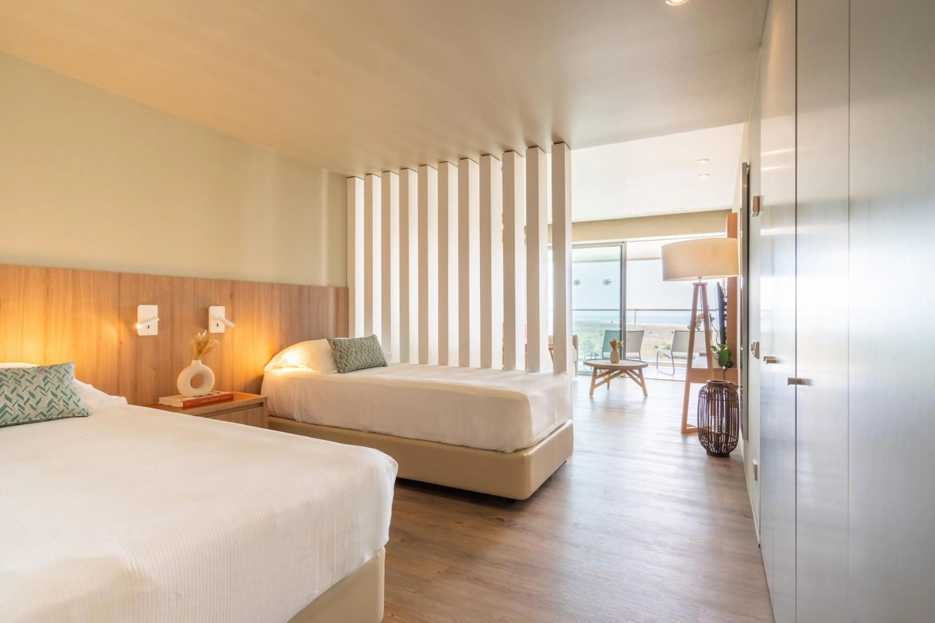 Bed in Aqualuz Troia Mar by The Editory