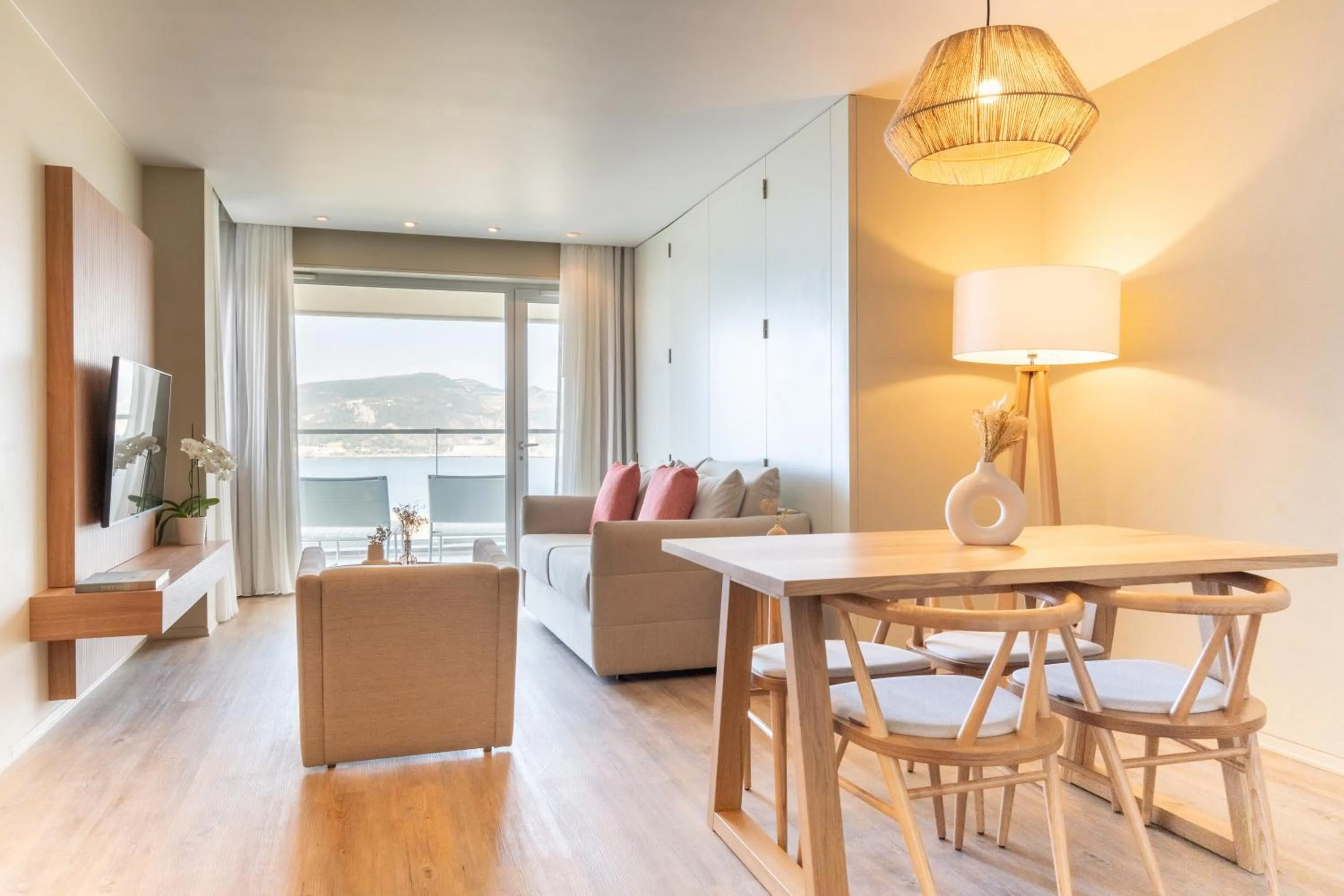 Living room in Aqualuz Troia Mar by The Editory