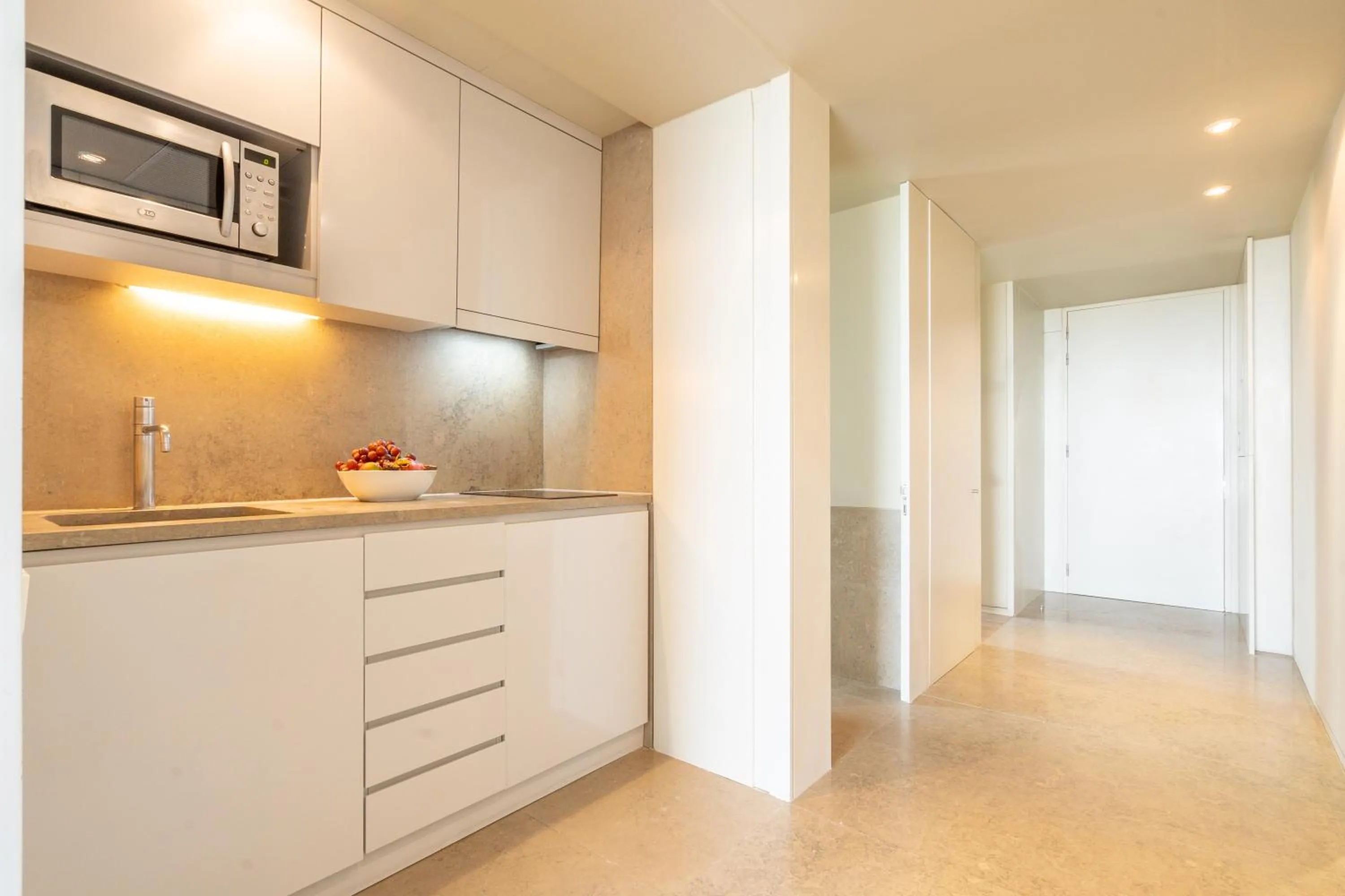 Kitchen or kitchenette in Aqualuz Troia Mar by The Editory