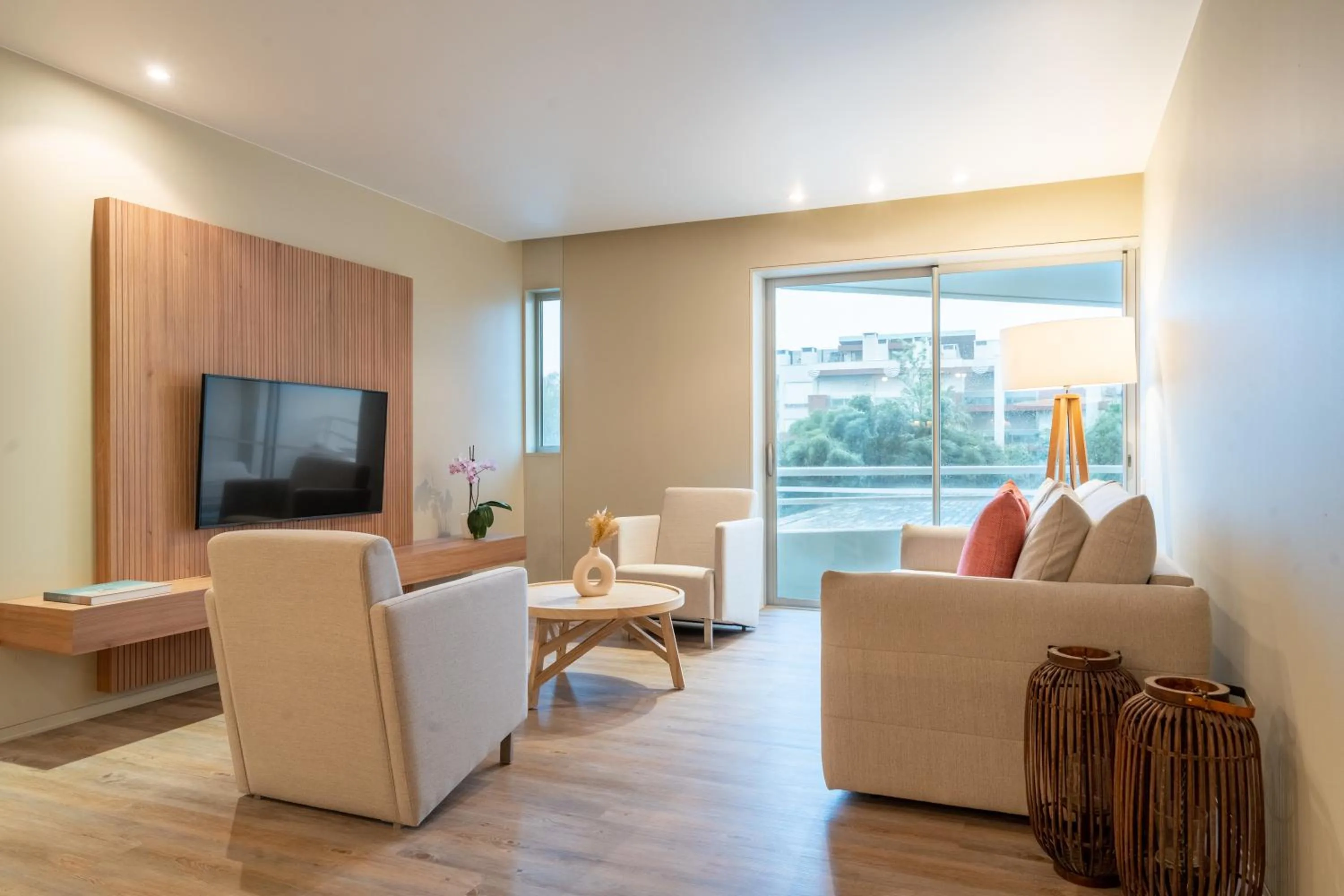 Living room in Aqualuz Troia Mar by The Editory