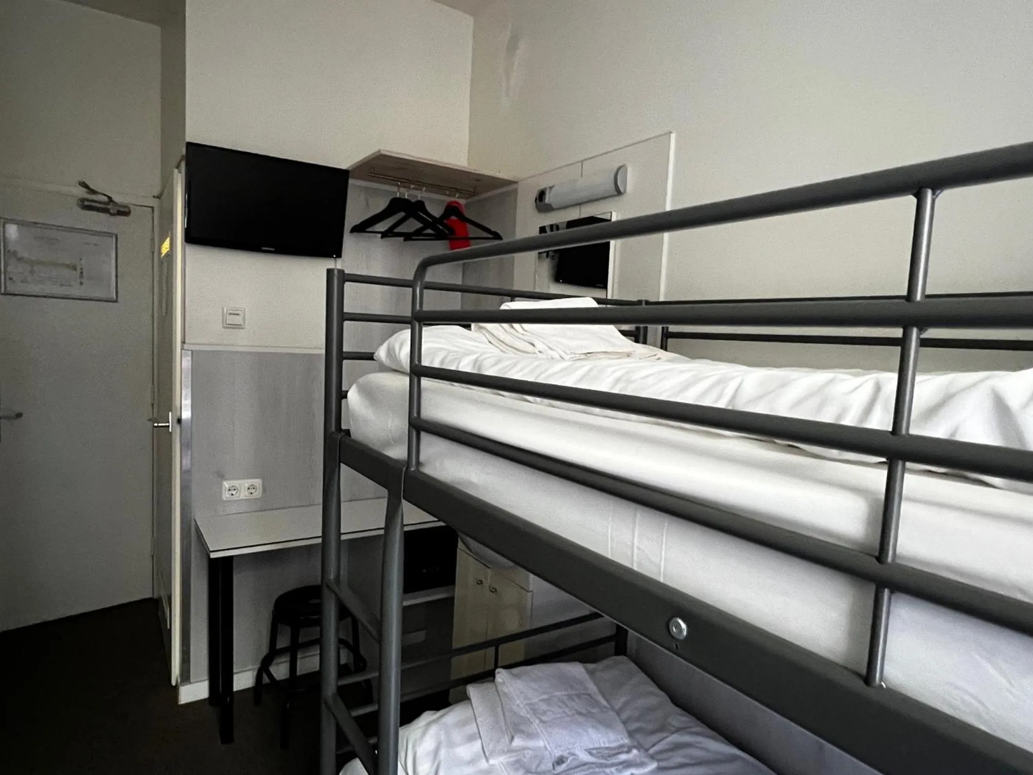 Bed in Budget Trianon Hotel