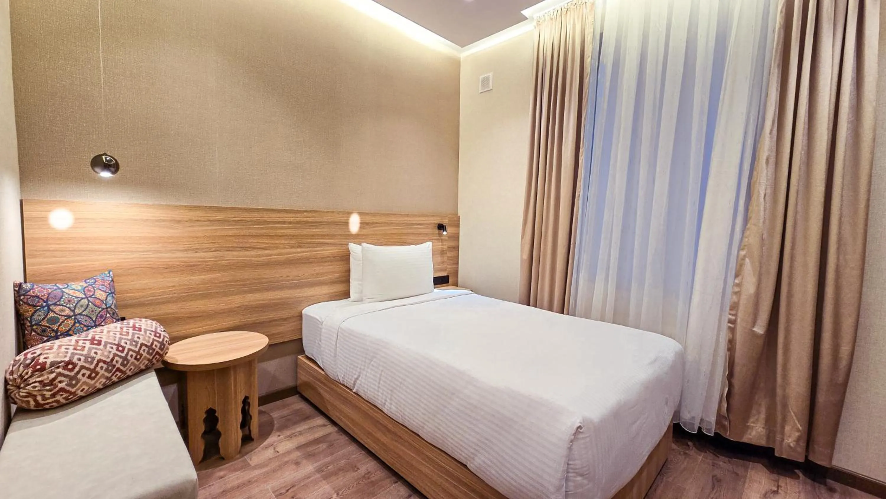 Bed in Hotel Bankir Khiva