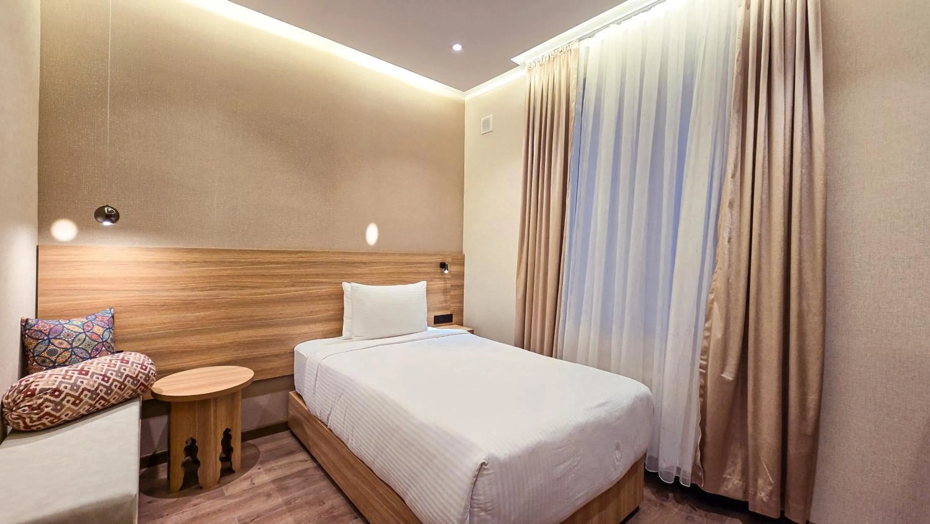 Bed in Hotel Bankir Khiva