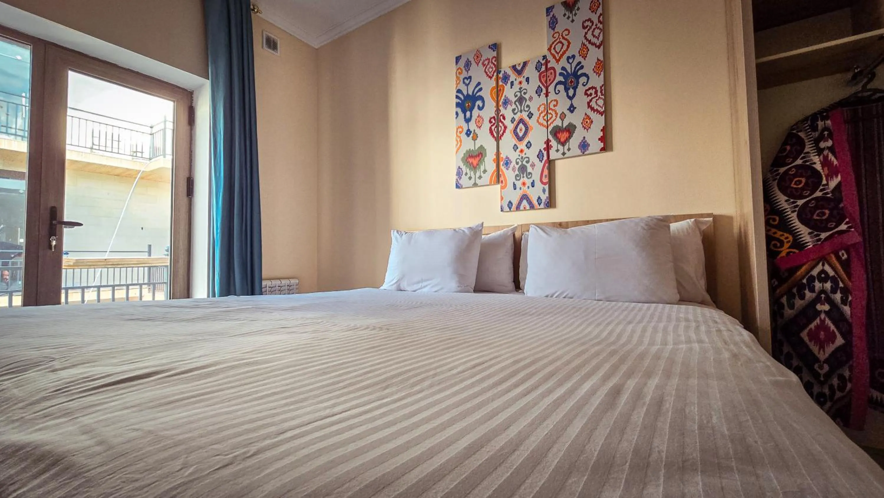 Bed in Hotel Bankir Khiva