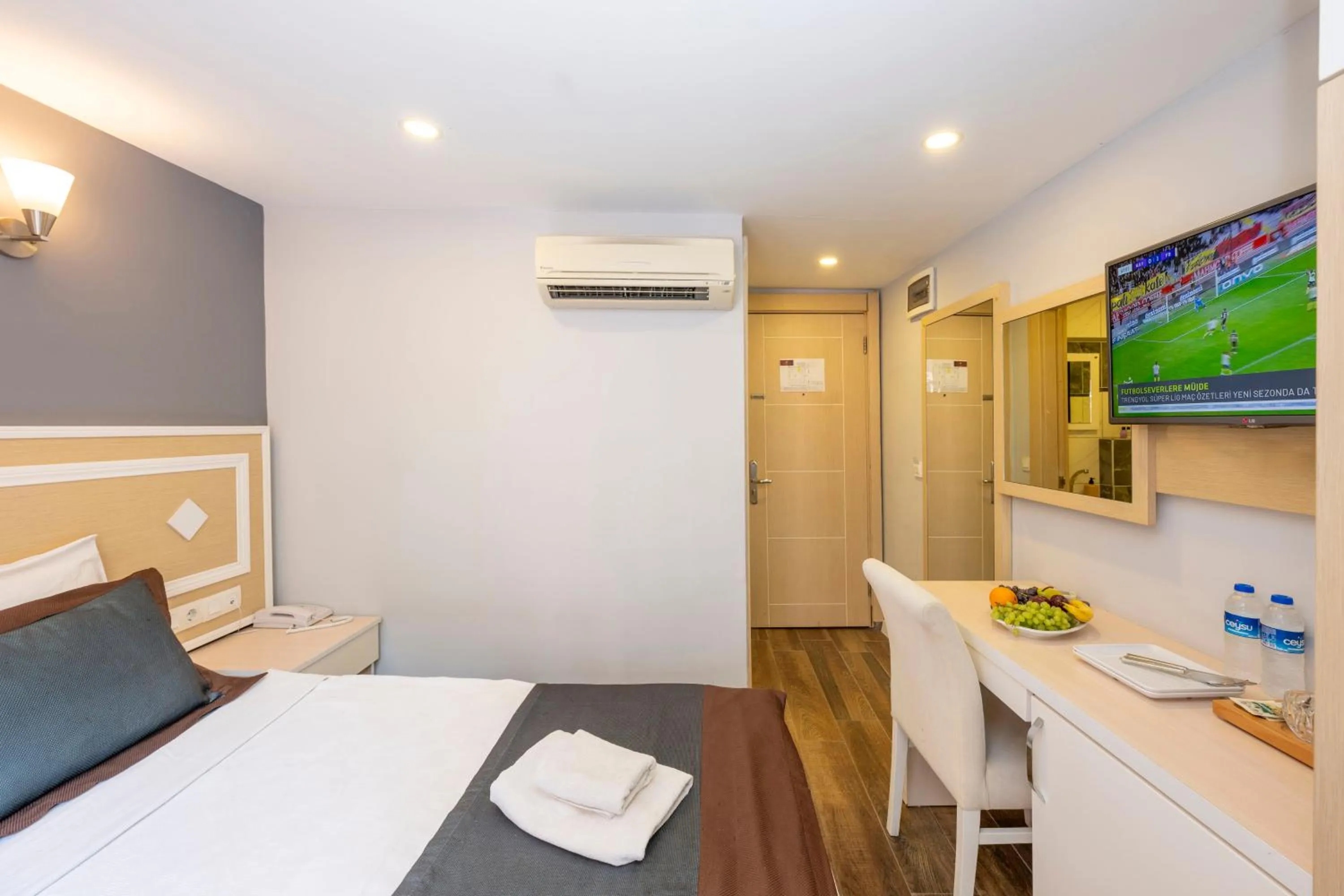 Bed in LEGEND TULIP HOTEL