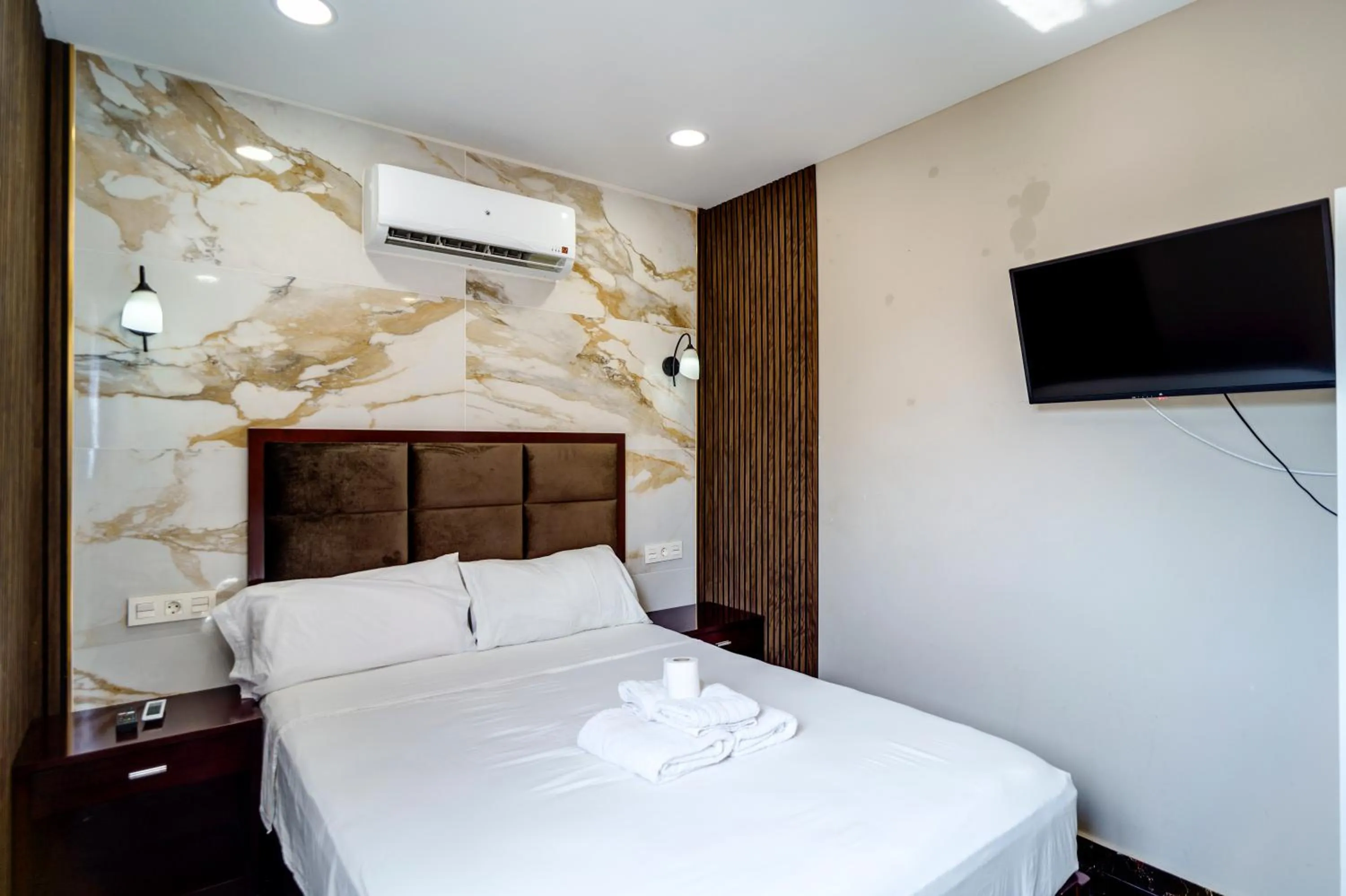 Communal lounge/ TV room, Bed in Rancho Grande