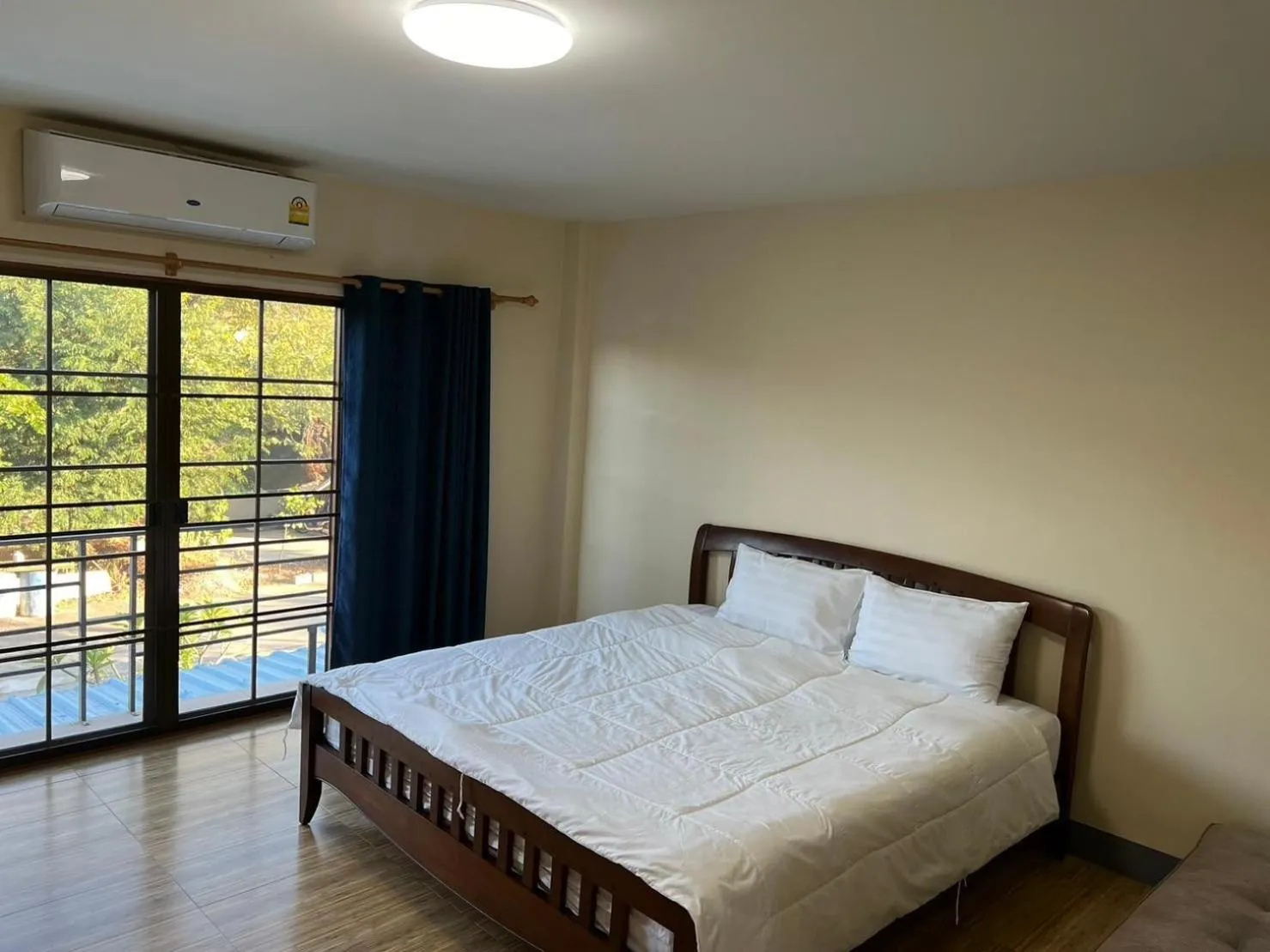 Bed in V Tharm Hotel