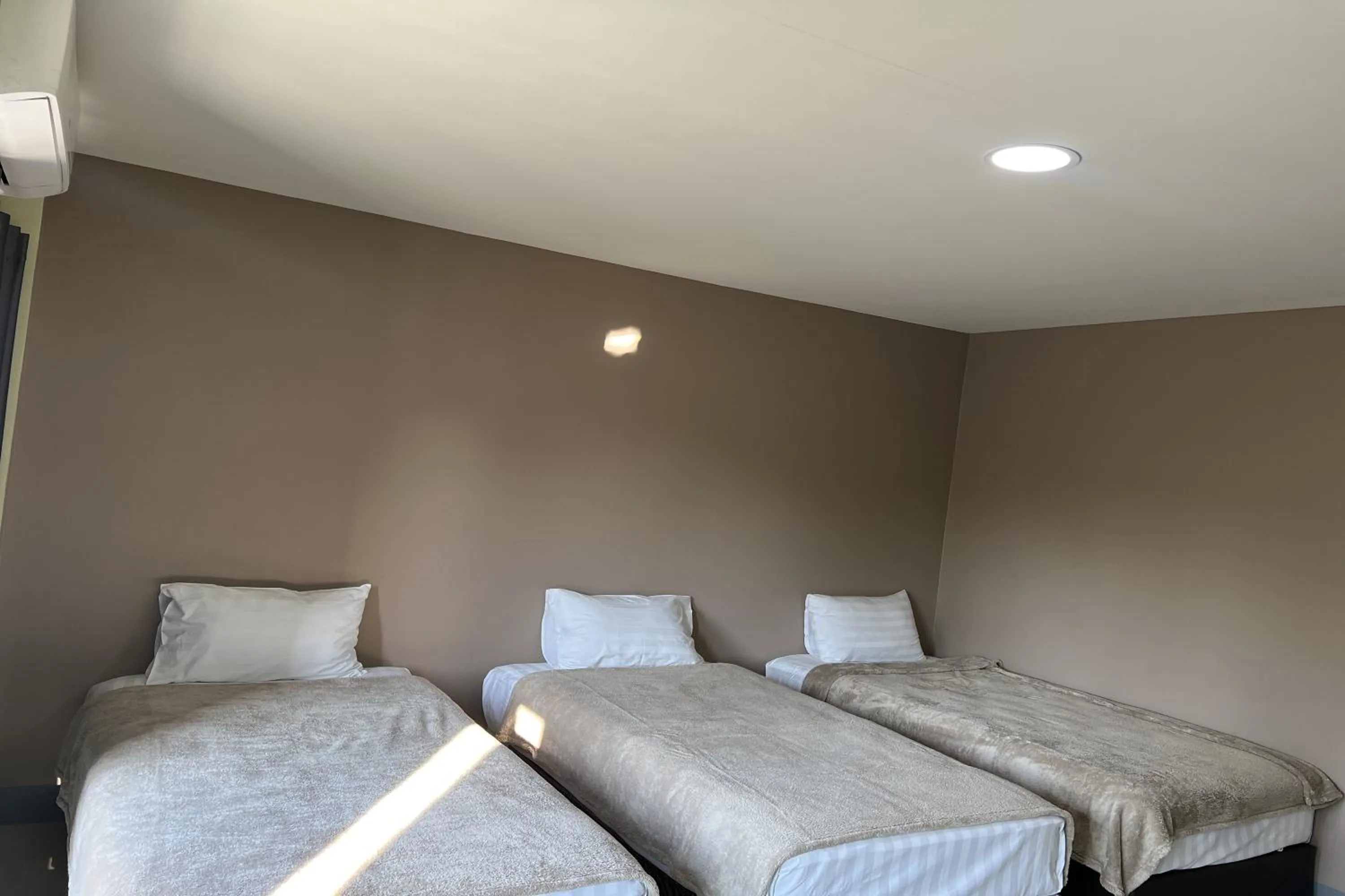 Bed in V Tharm Hotel