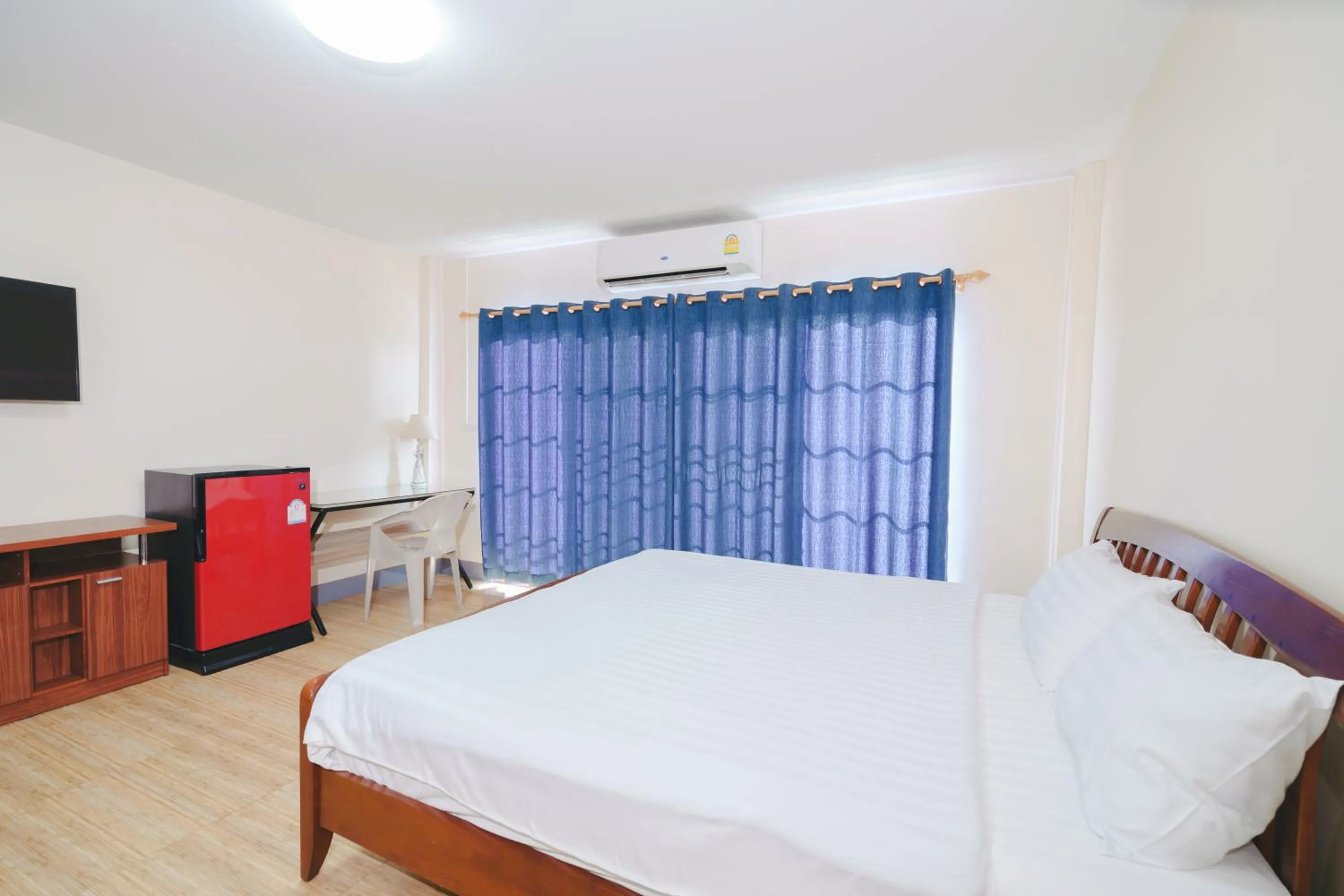 Bed in V Tharm Hotel