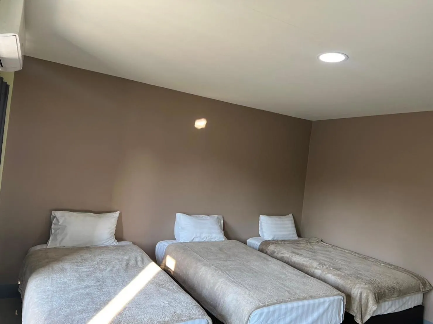 Bed in V Tharm Hotel