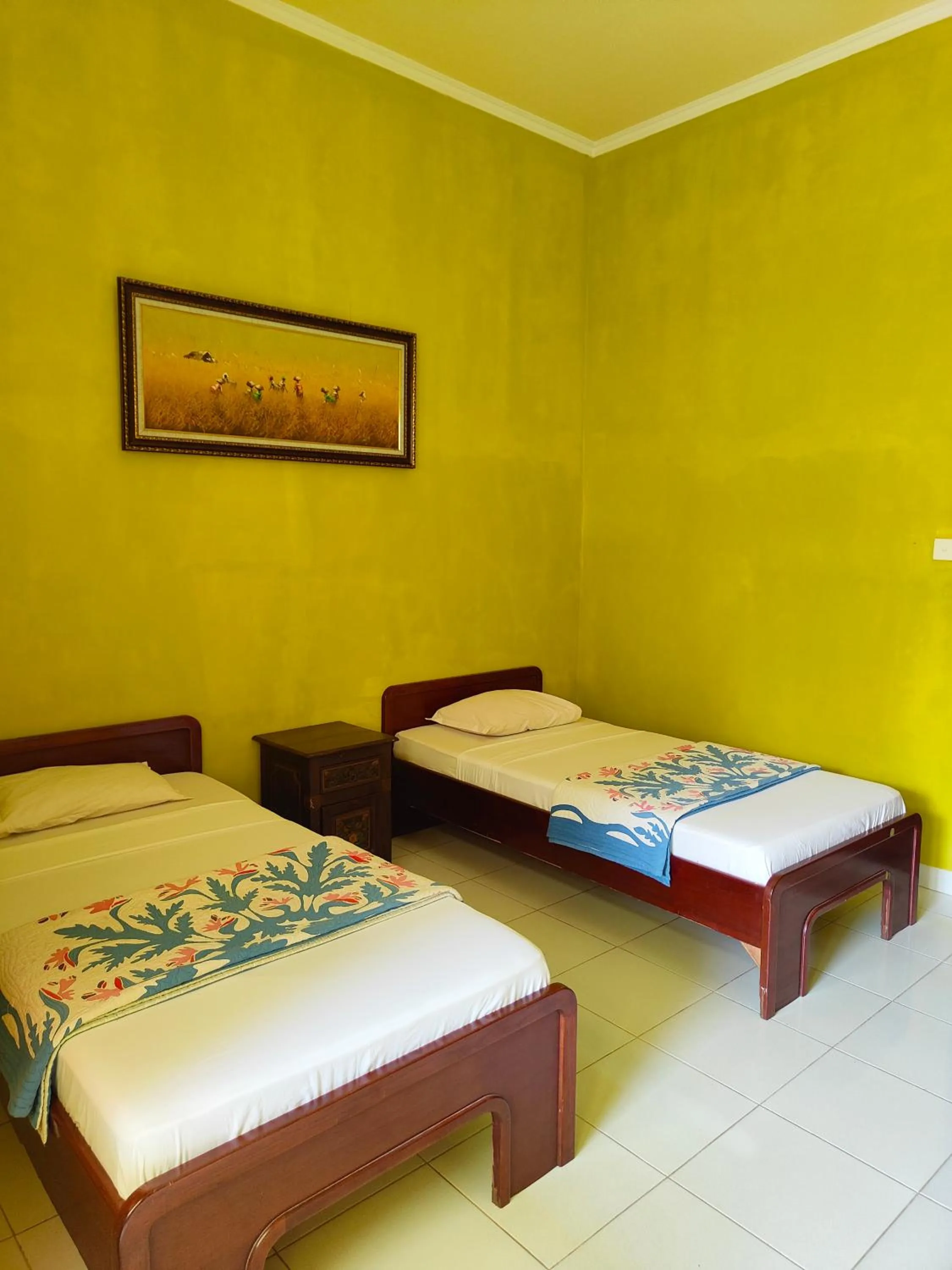 Bed in Berlian Inn Kuta Beach