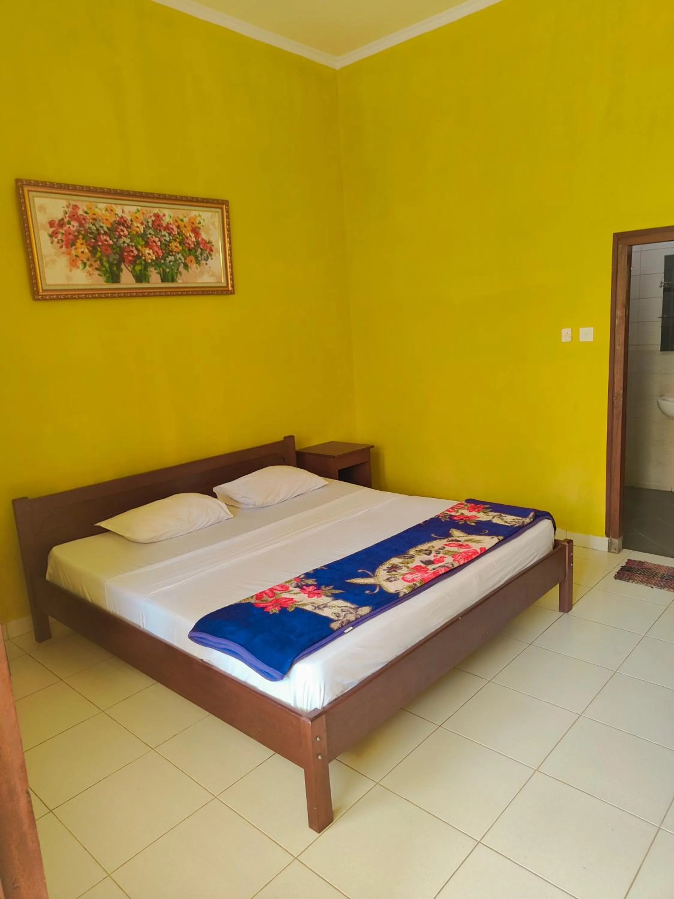 Bed in Berlian Inn Kuta Beach