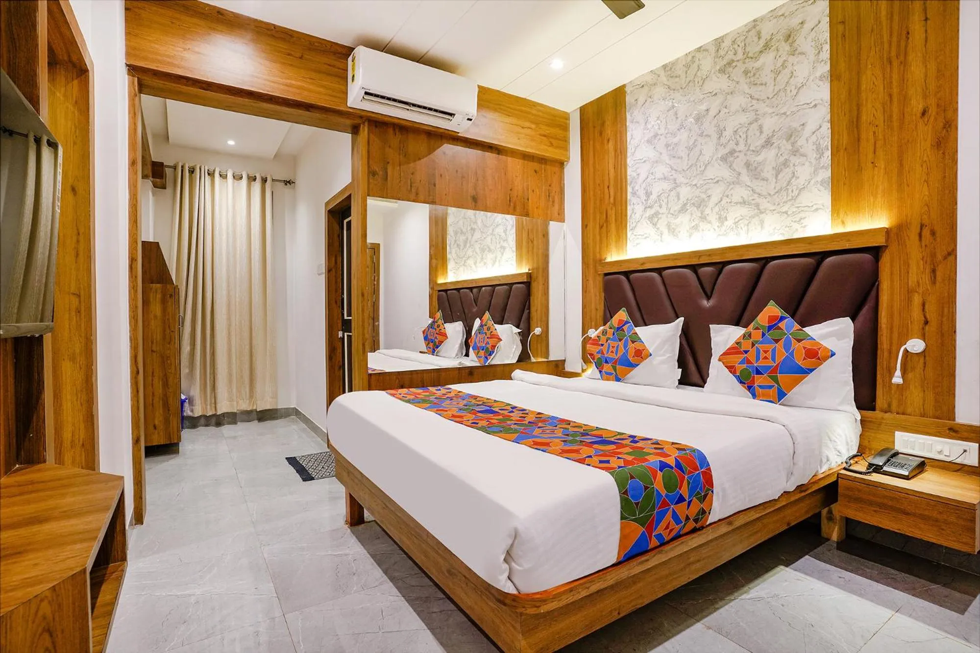 Bedroom in FabHotel Grand Residency
