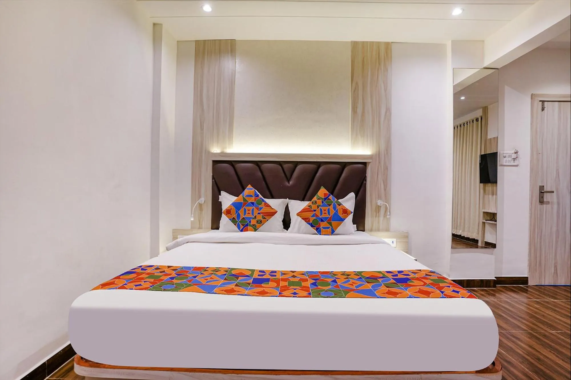 Bed in FabHotel Grand Residency