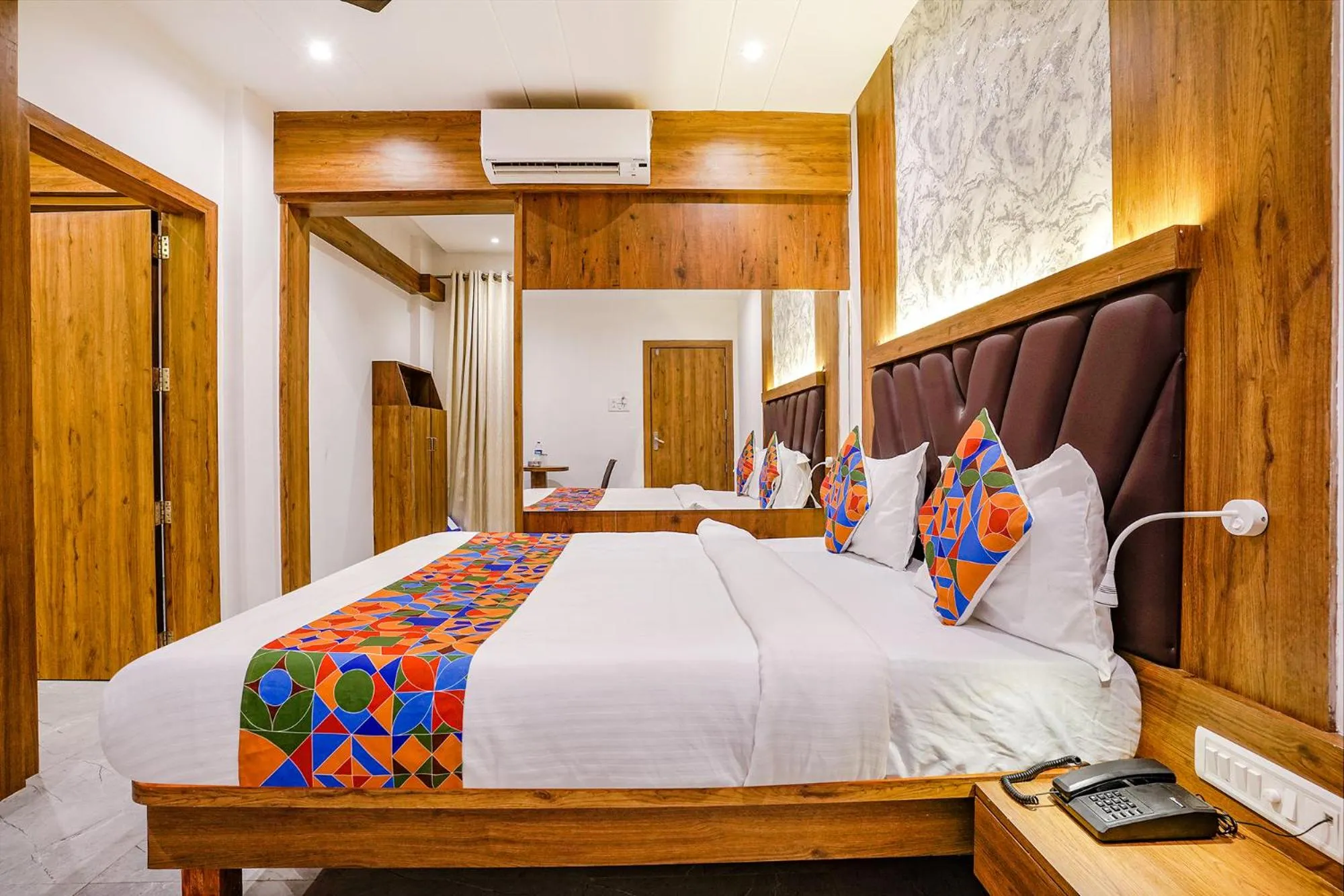 Bedroom in FabHotel Grand Residency