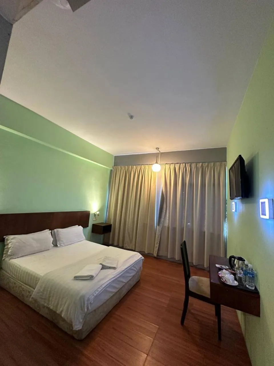 Bed in De Choice Hotel Tawau