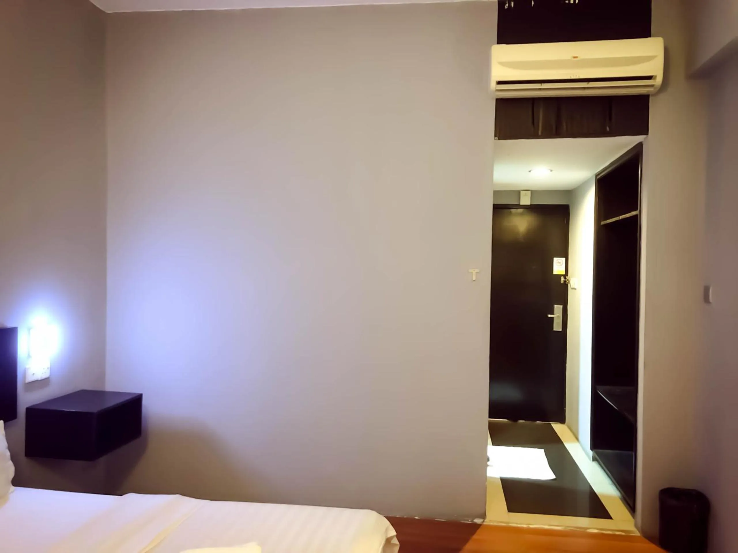 Bed in De Choice Hotel Tawau