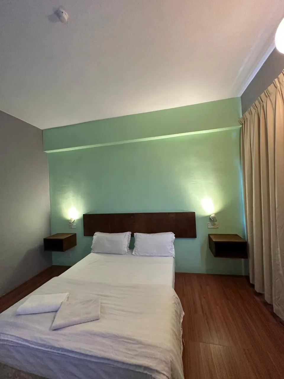 Bed in De Choice Hotel Tawau