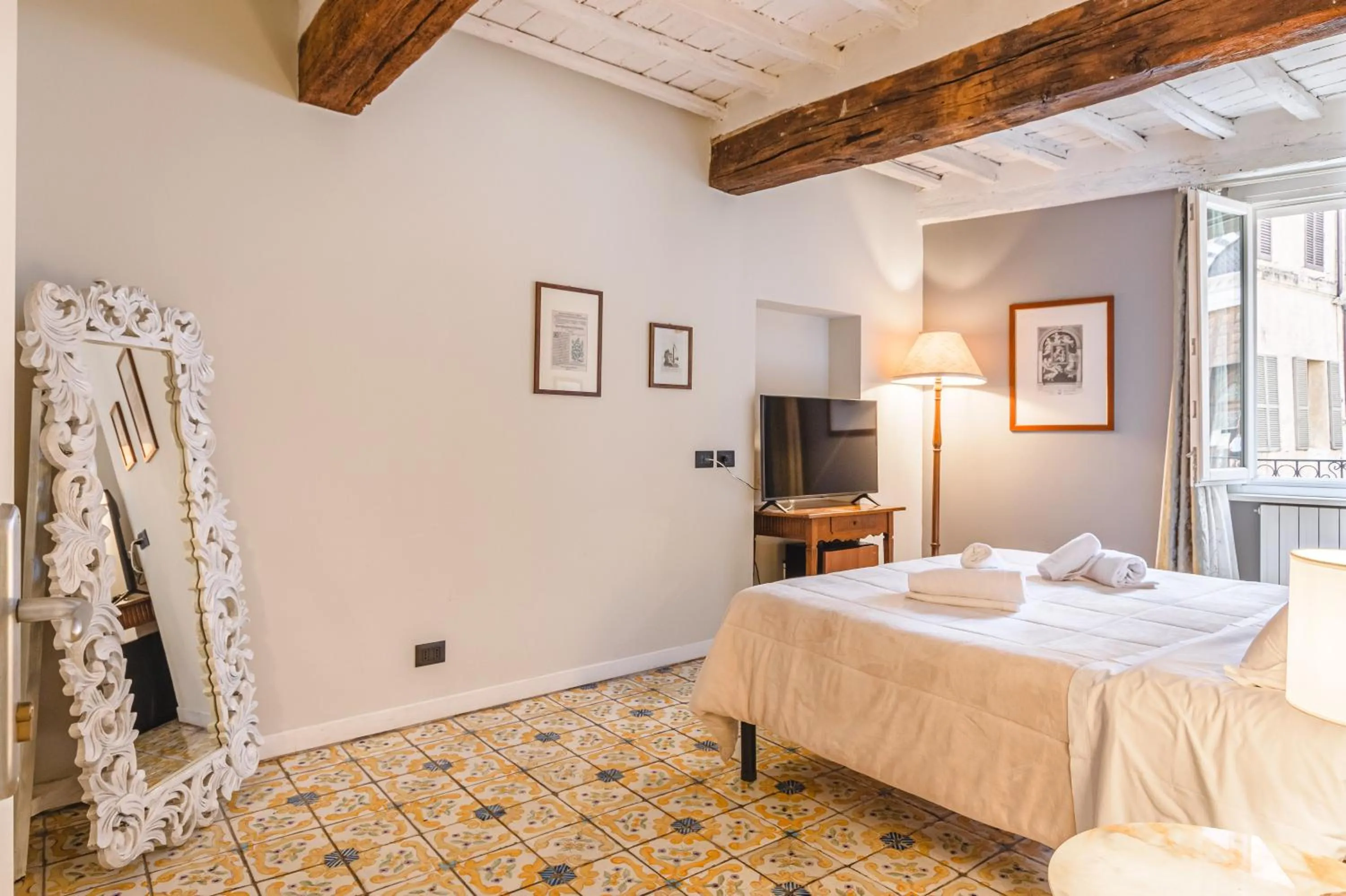 Bed in Il Battistero Siena Residenza d'Epoca