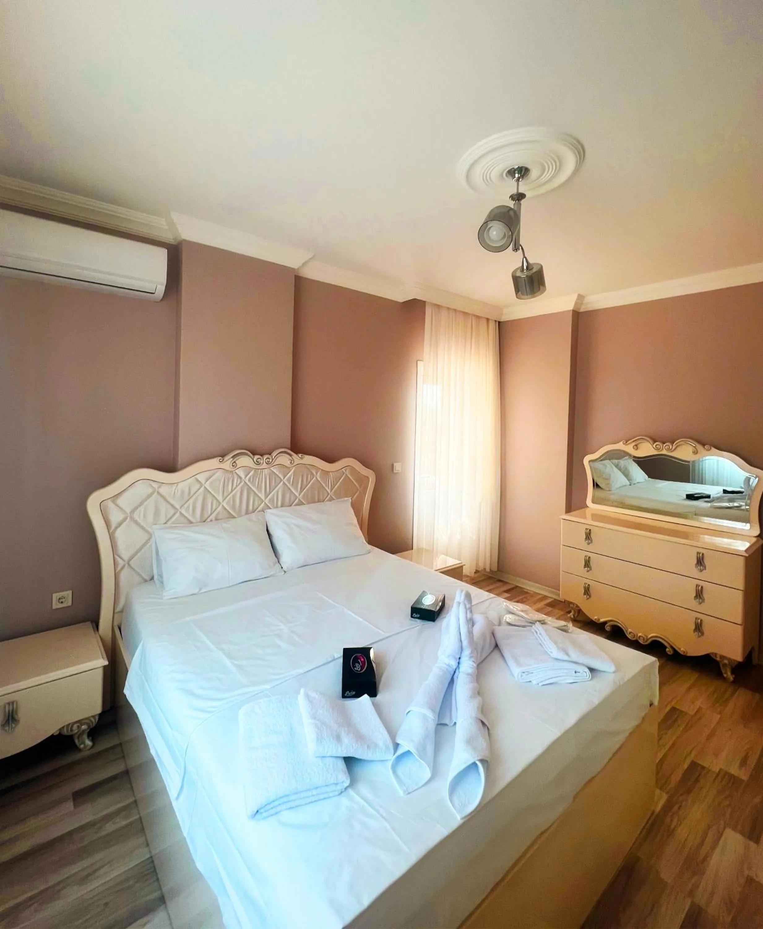 Bed in Seabird Suite Apart Hotel