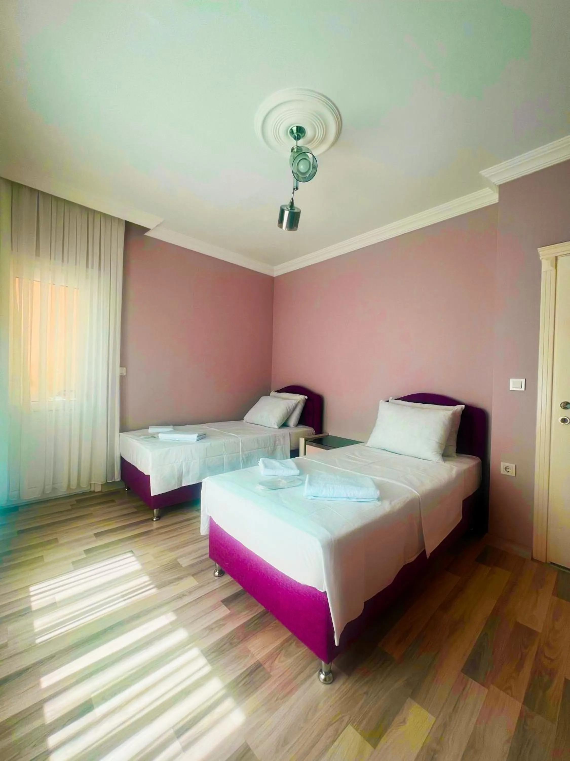 Bed in Seabird Suite Apart Hotel