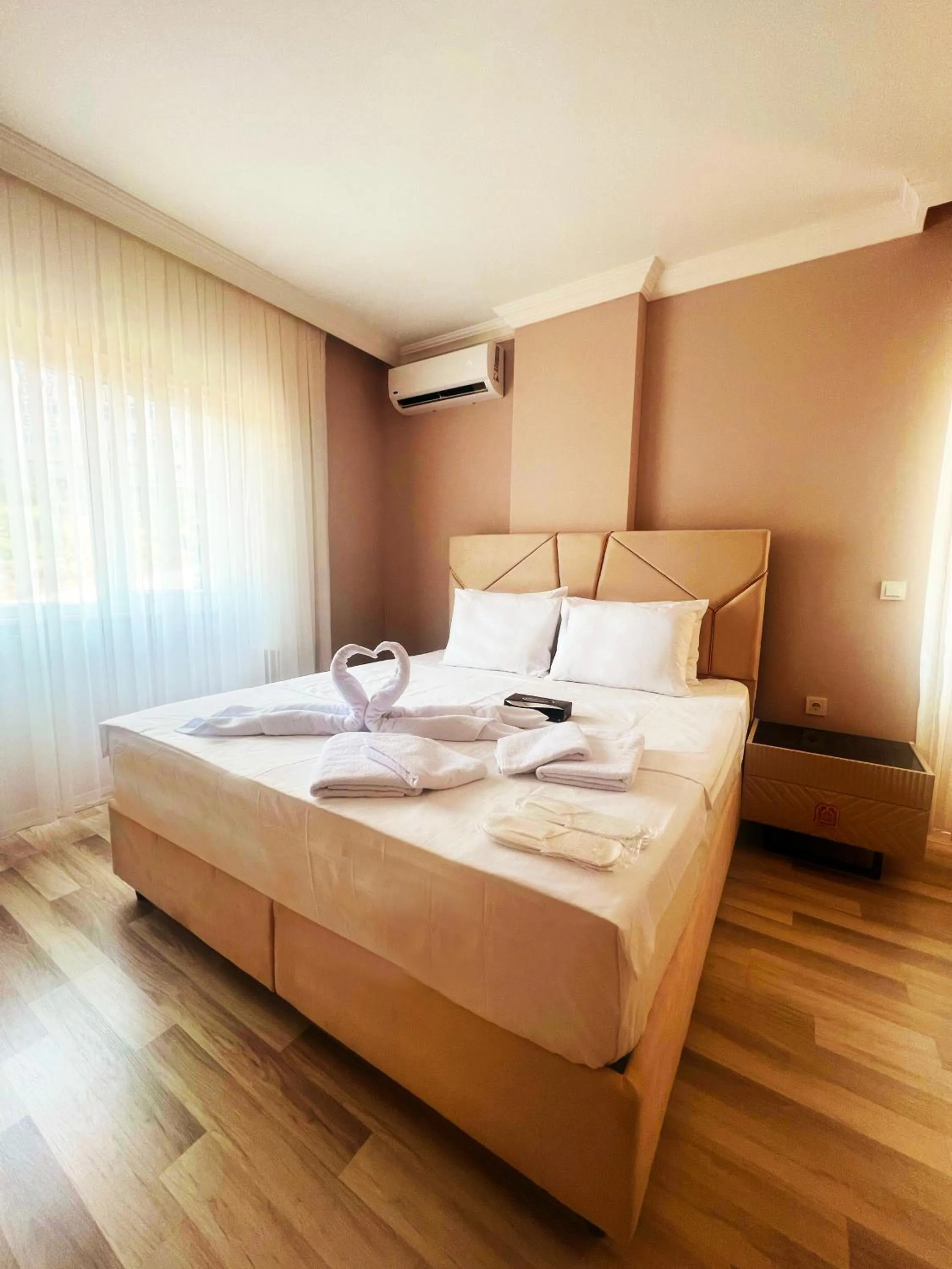 Bed in Seabird Suite Apart Hotel