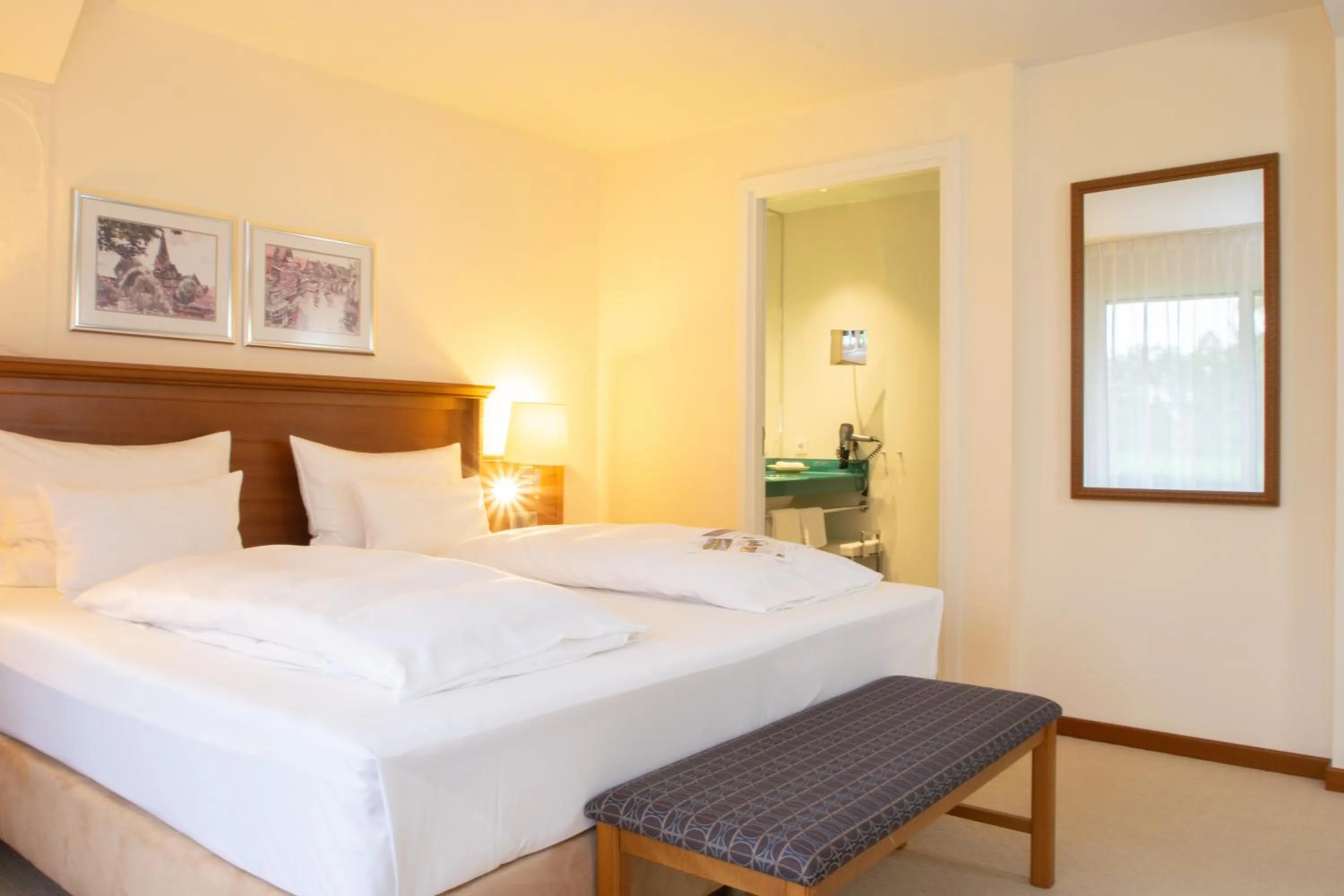 Bed in Fletcher Parkhotel De Wiemsel