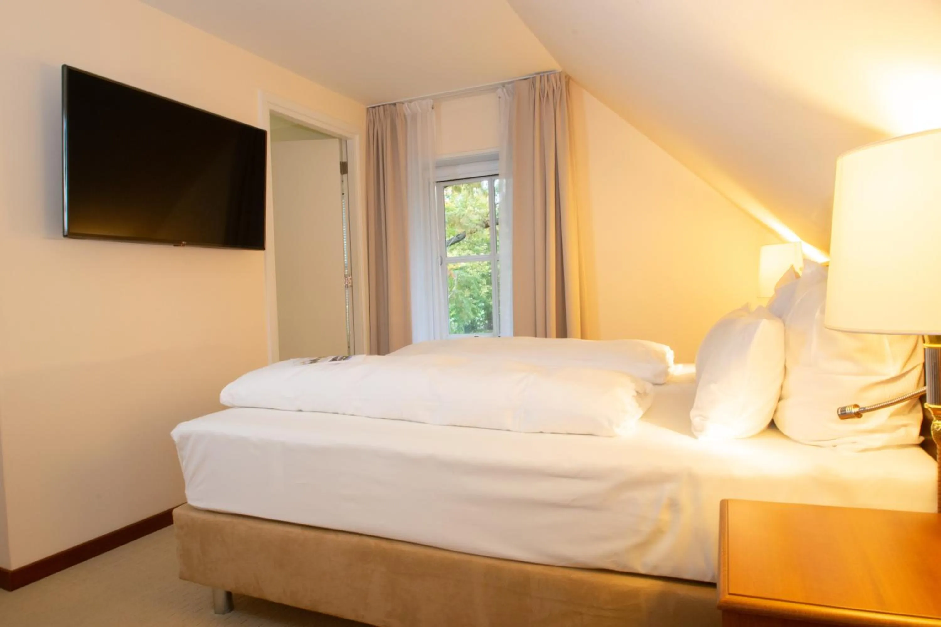 Bed in Fletcher Parkhotel De Wiemsel