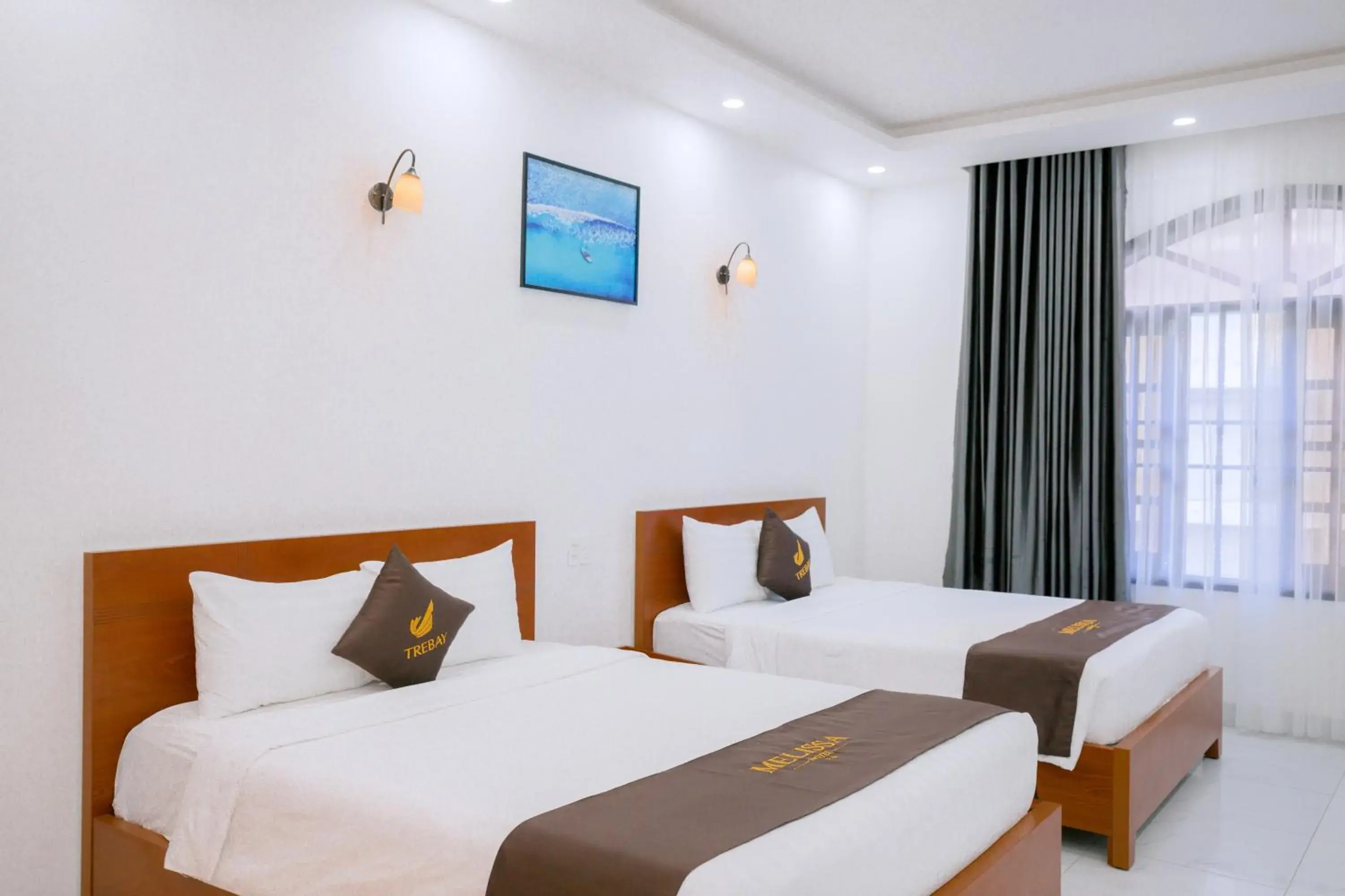 Deluxe Triple Room in Melissa Hotel - Vung Tau Deluxe Triple Room in Melissa Hotel - Vung Tau