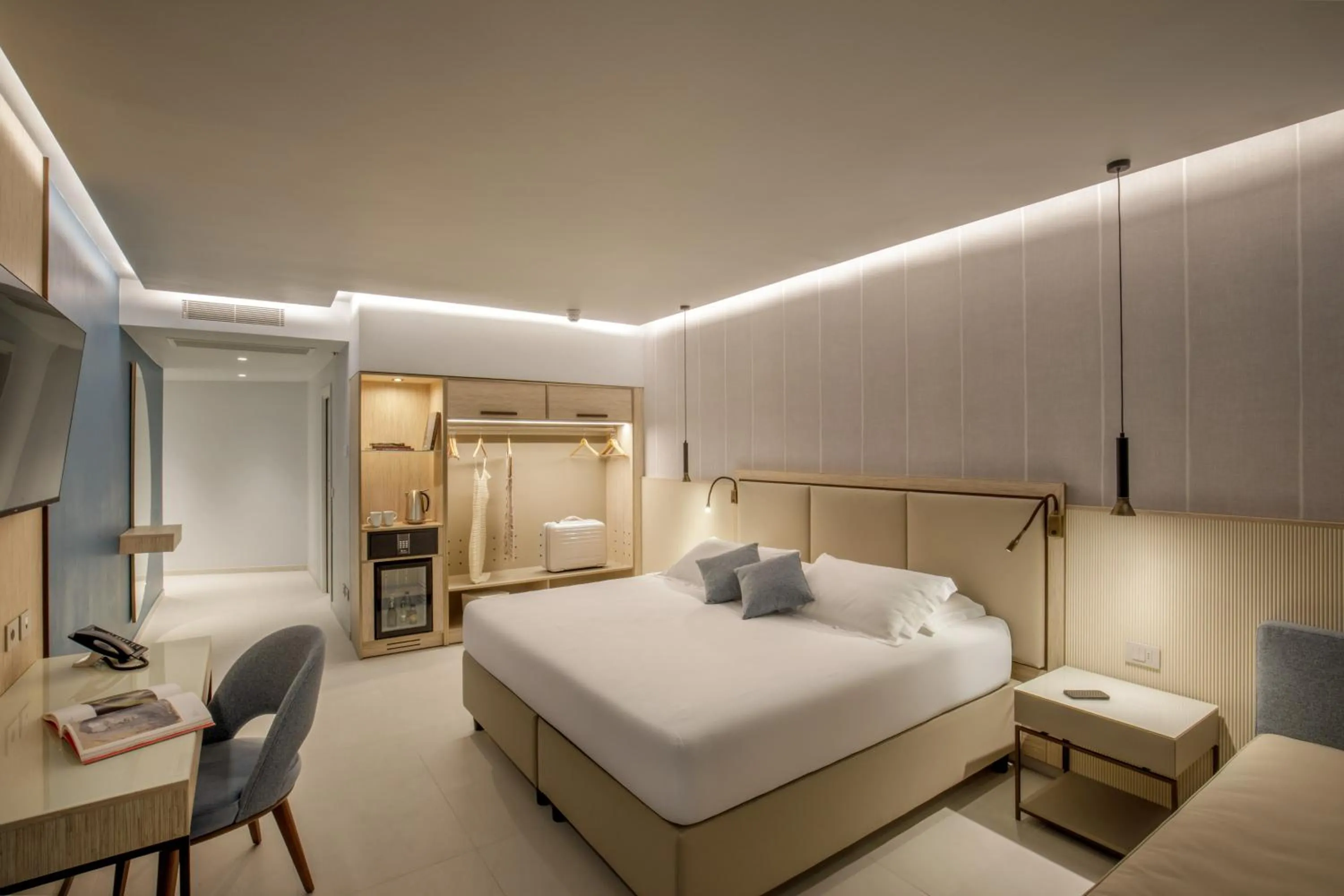 Bed in Ambasciatori Suite Hotel