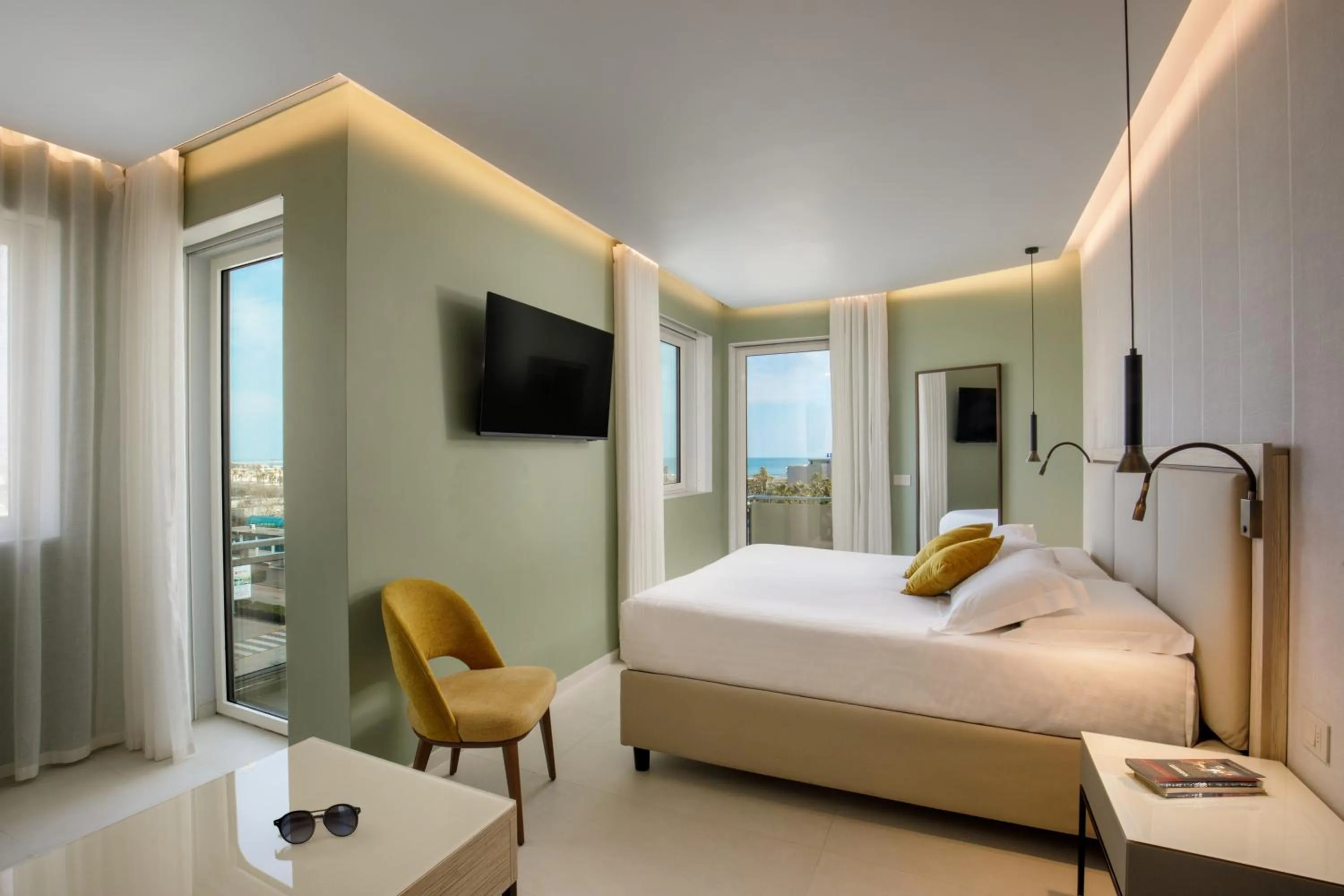 Bed in Ambasciatori Suite Hotel