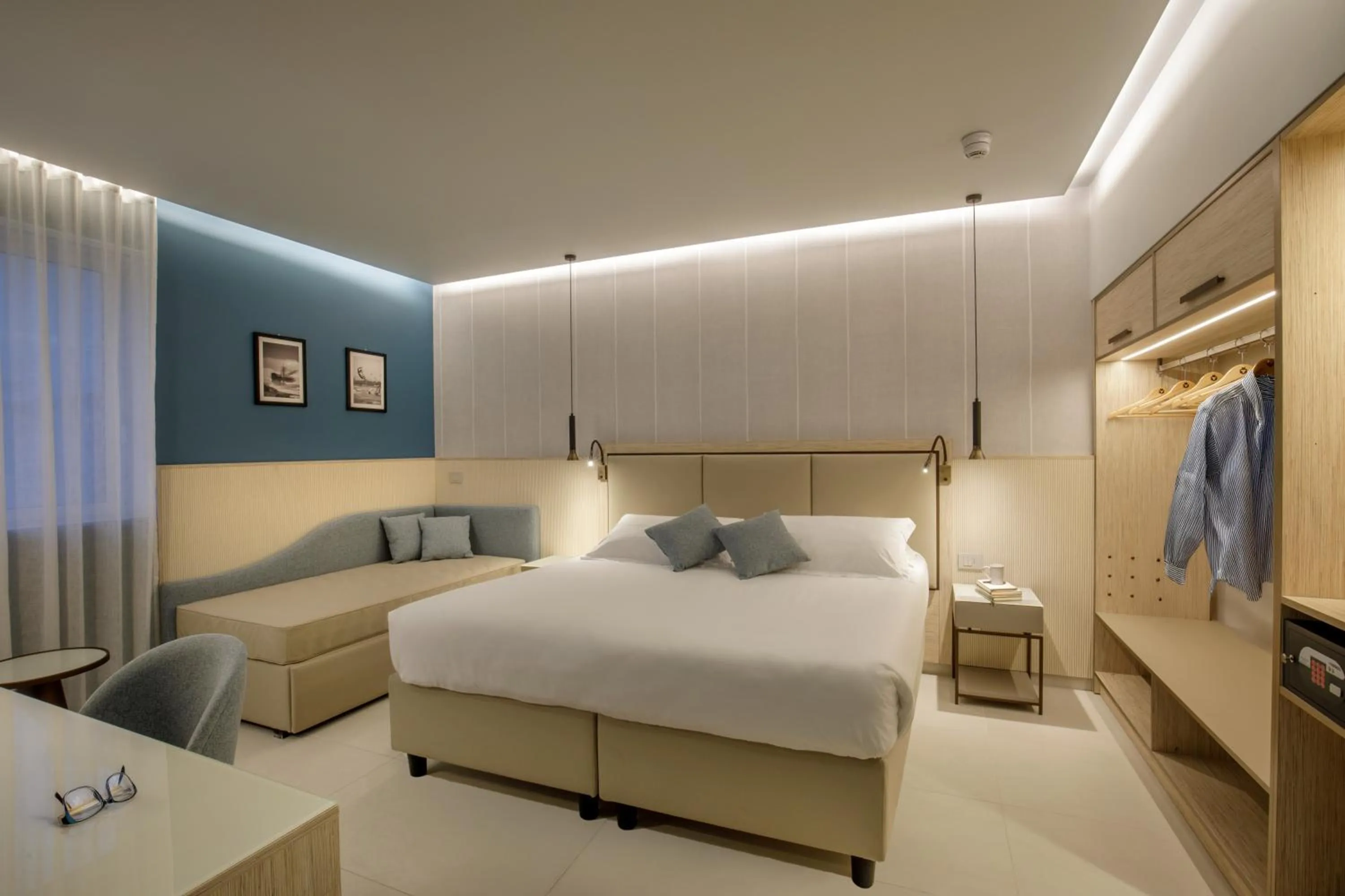 Bed in Ambasciatori Suite Hotel